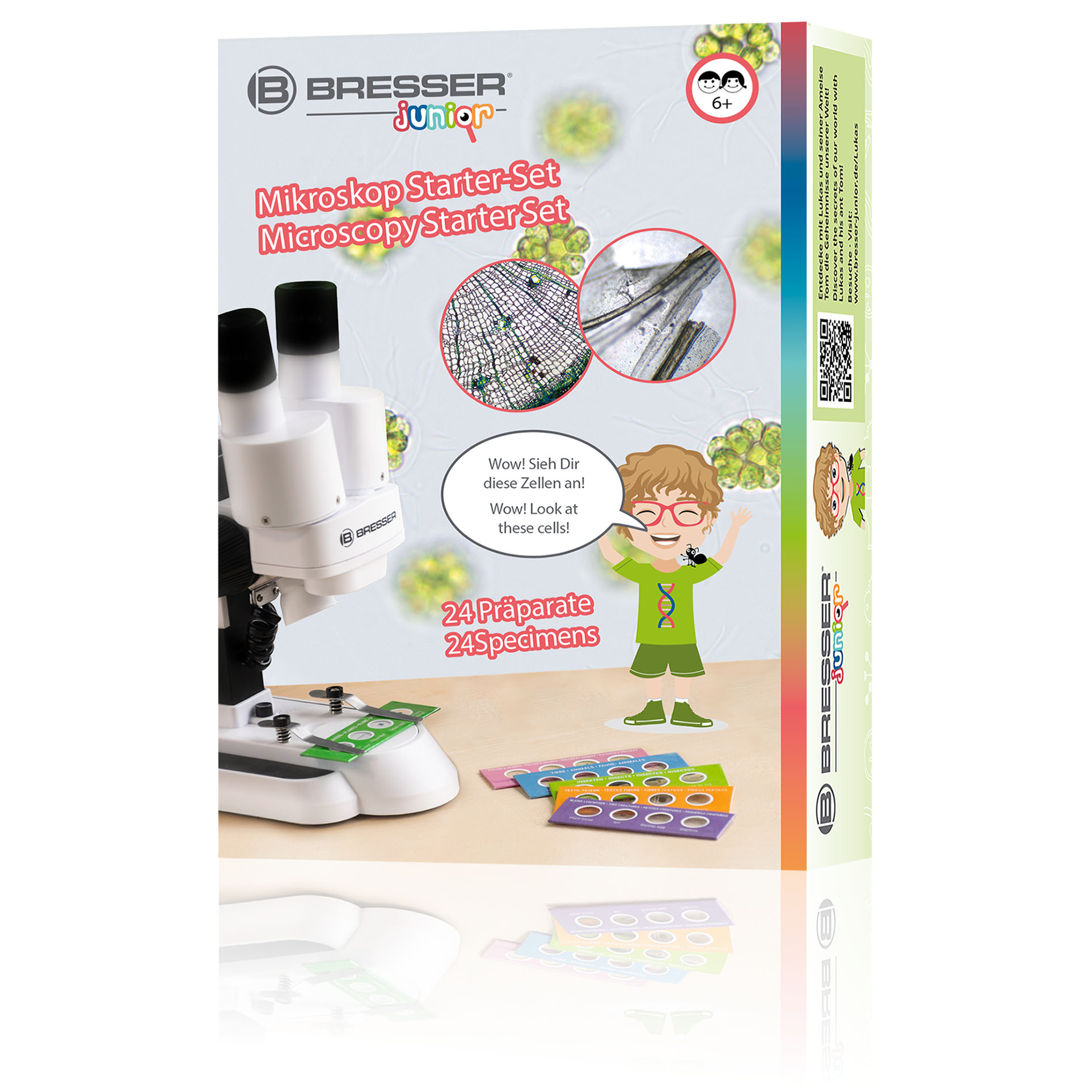 Un kit de iniciación a la microscopía con microscopio, portaobjetos y dibujo infantil.