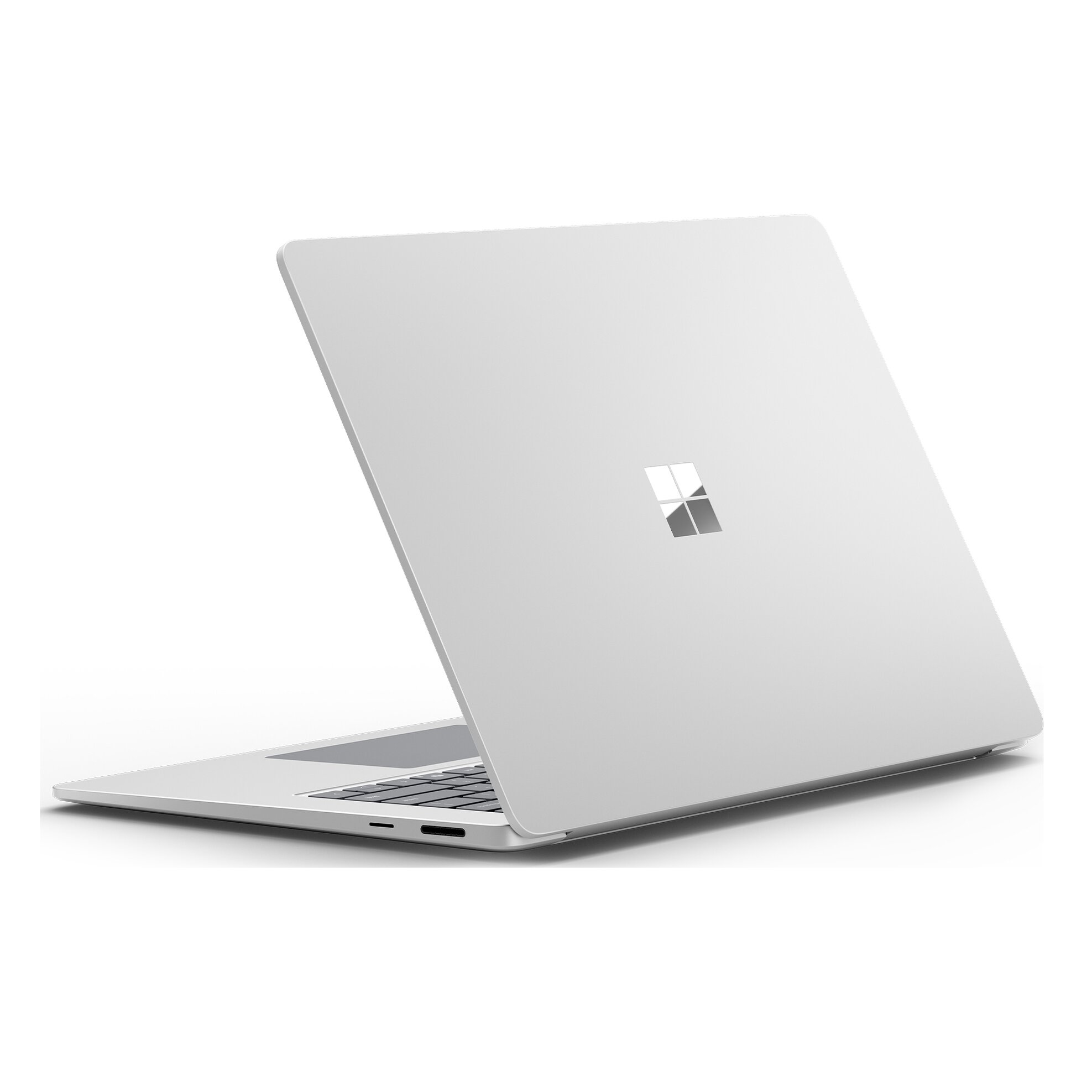 Laptop bianco, parzialmente aperto, mostra tastiera e schermo con logo Microsoft. Sfondo bianco.