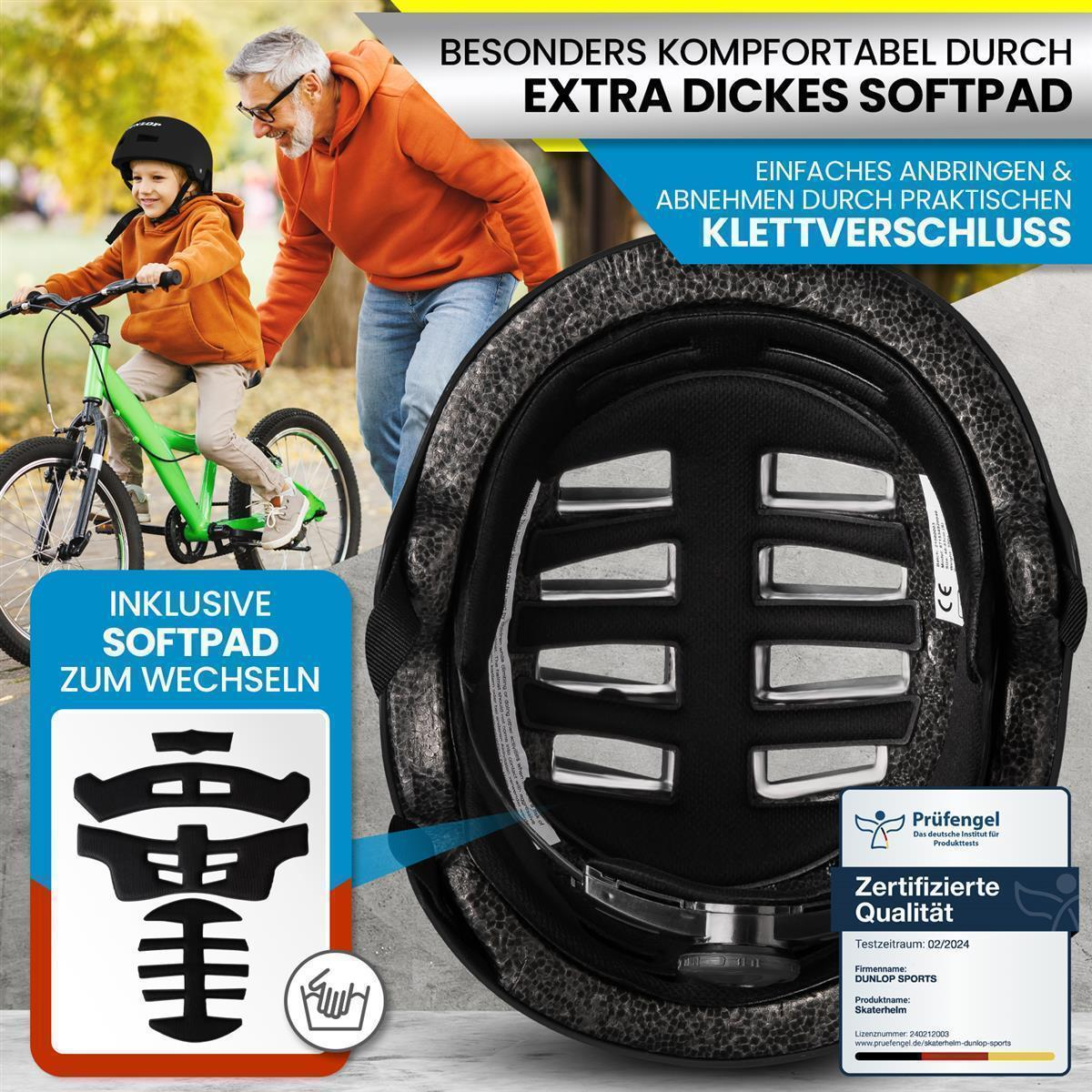 Ein Mann und ein Kind mit Helm. Das Kind sitzt auf einem grünen Fahrrad. Helm mit Polsterung.