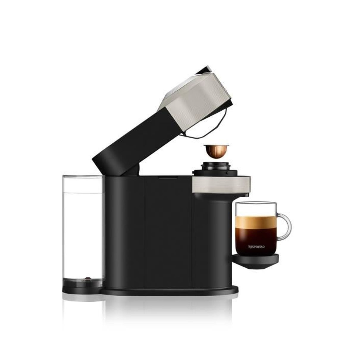 Macchina Nespresso nera e argento con una tazza di caffè.