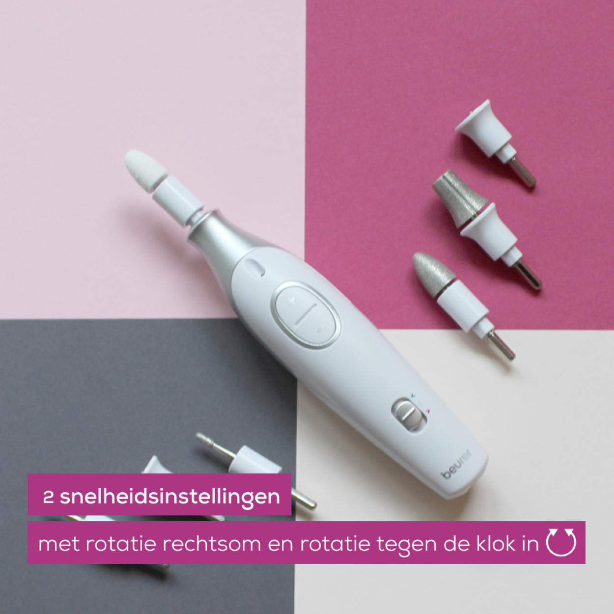 Lime à ongles électrique avec accessoires sur fond rose et gris.