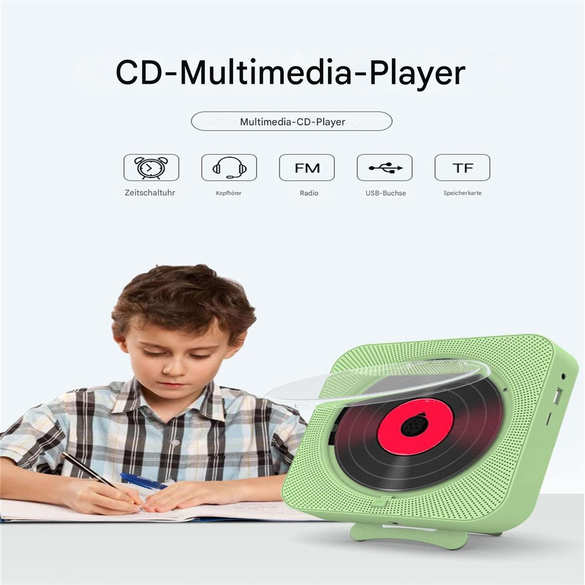 Ein Kind zeichnet an einem Tisch. Ein grüner CD-Player steht auf dem Tisch, mit Symbolen.