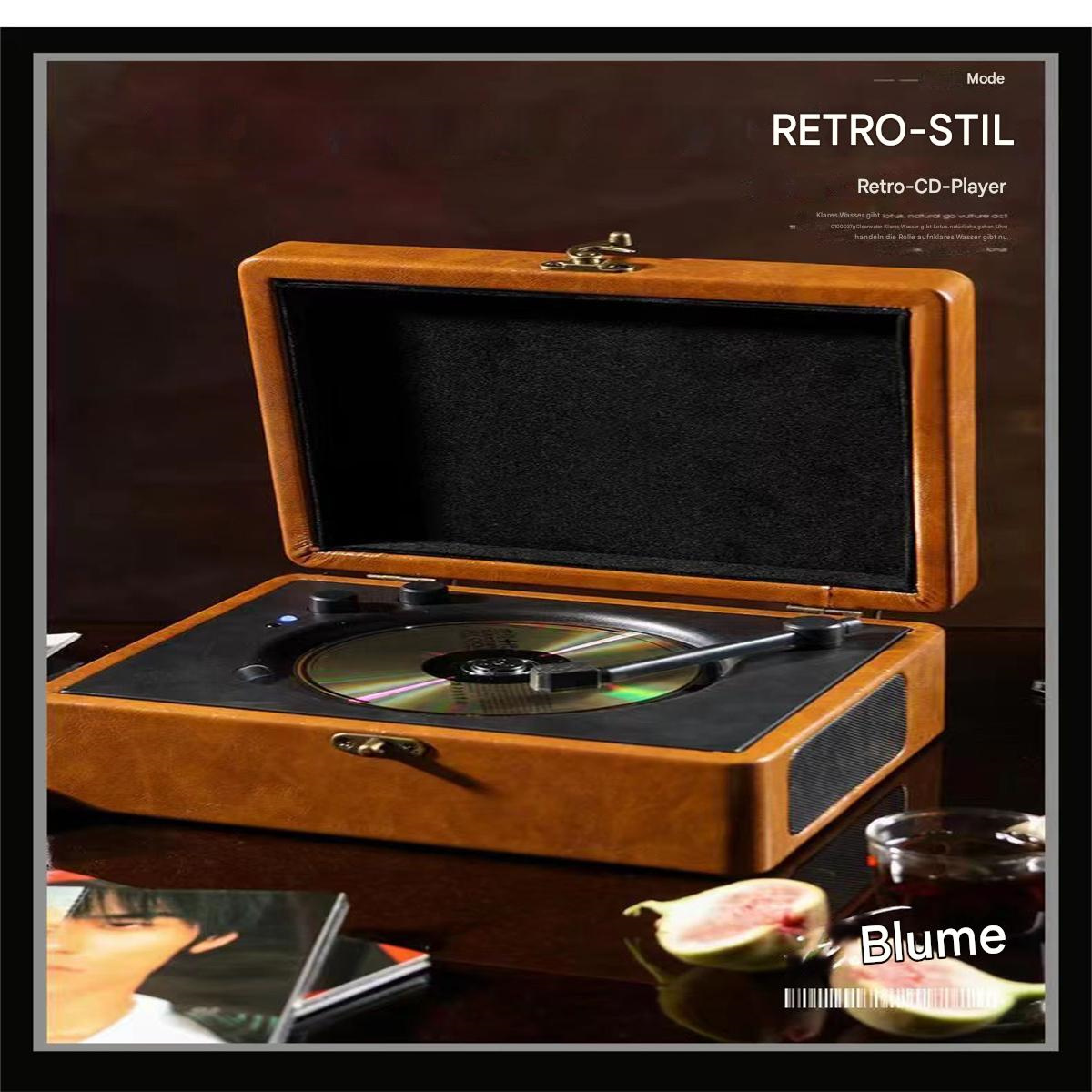 Ein CD-Player im Retro-Stil mit braunem Gehäuse und CD. Enthält Feige und Blume Text.