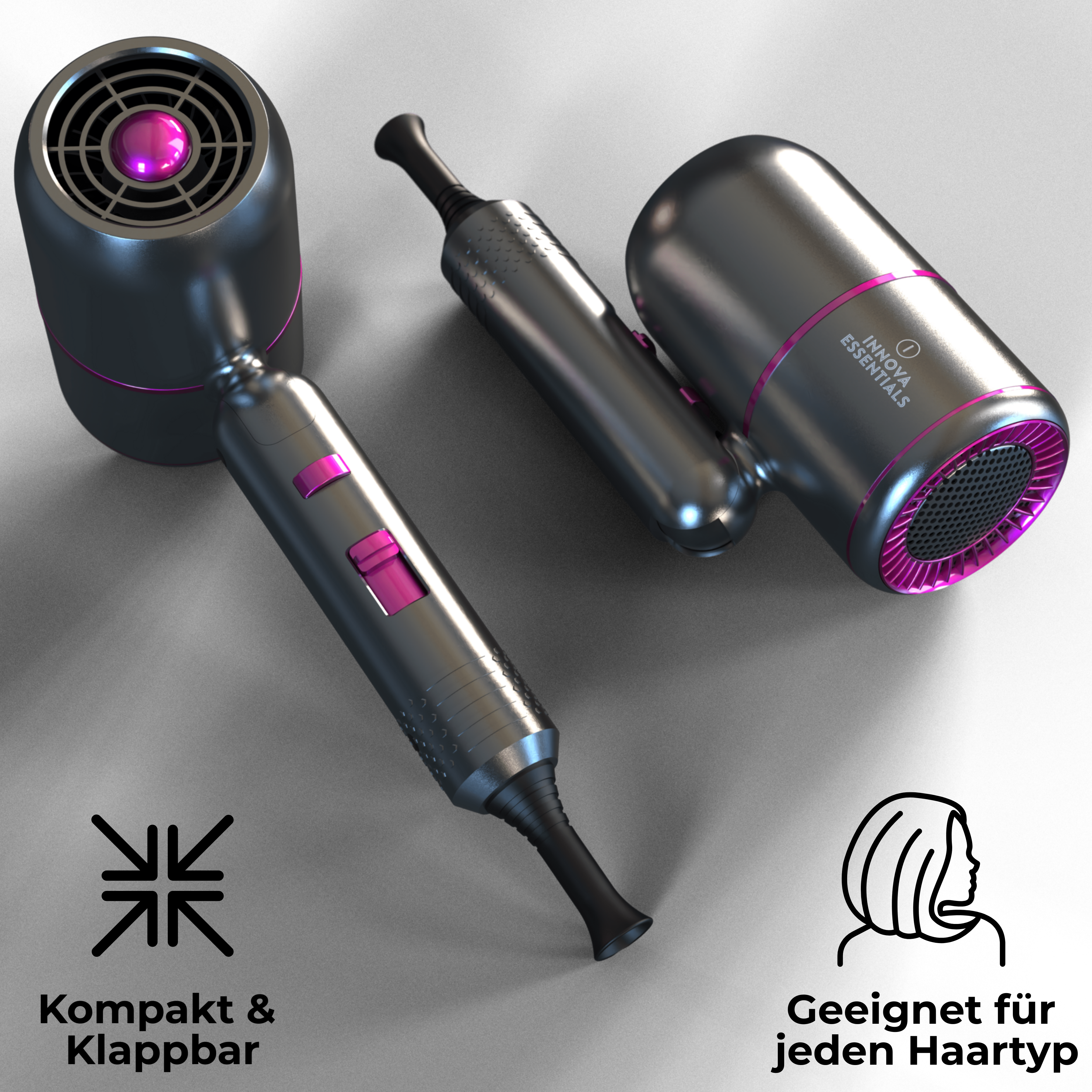 Kompakter, faltbarer Haartrockner, schwarz und grau, mit rosa Akzent, auf grauer Oberfläche.