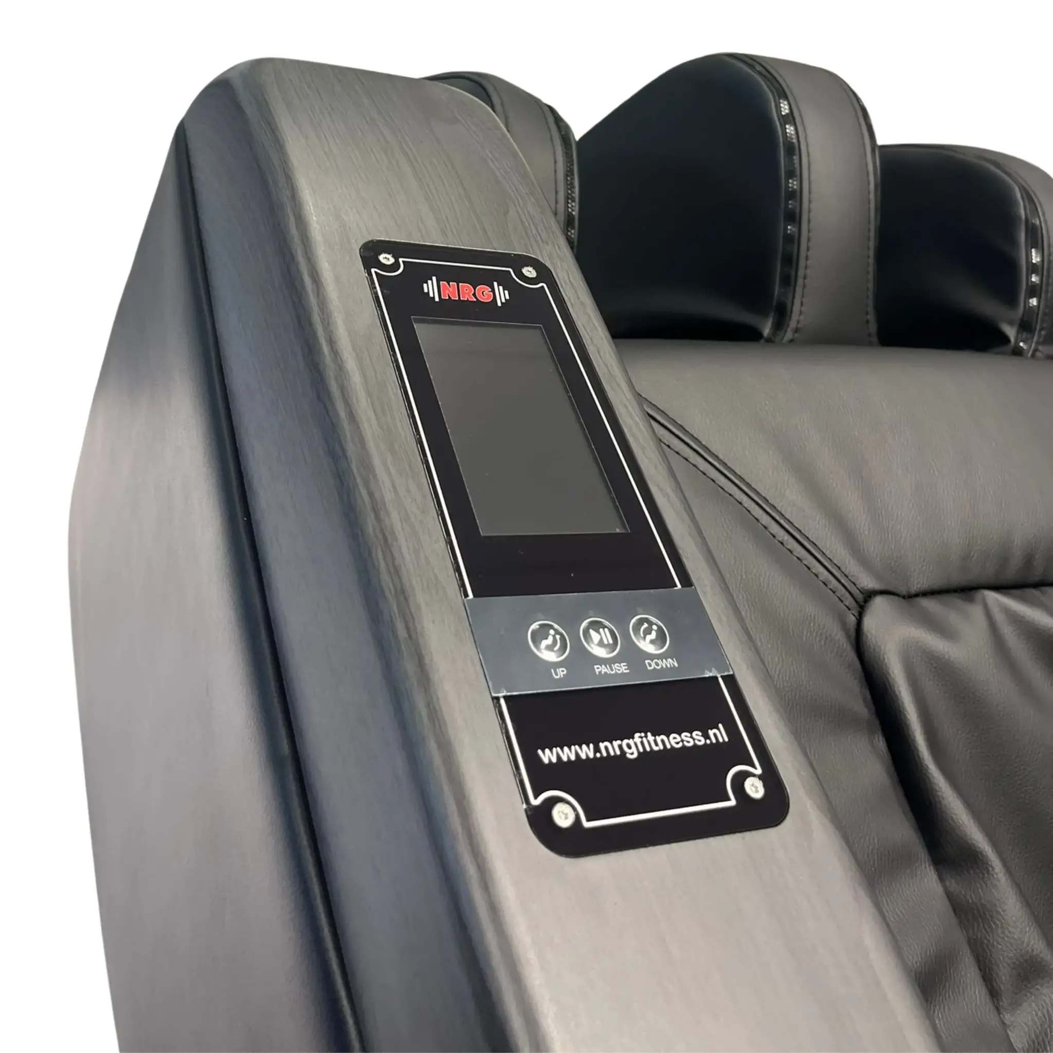 A close-up of a massage chair control panel showing buttons and a screen with text.