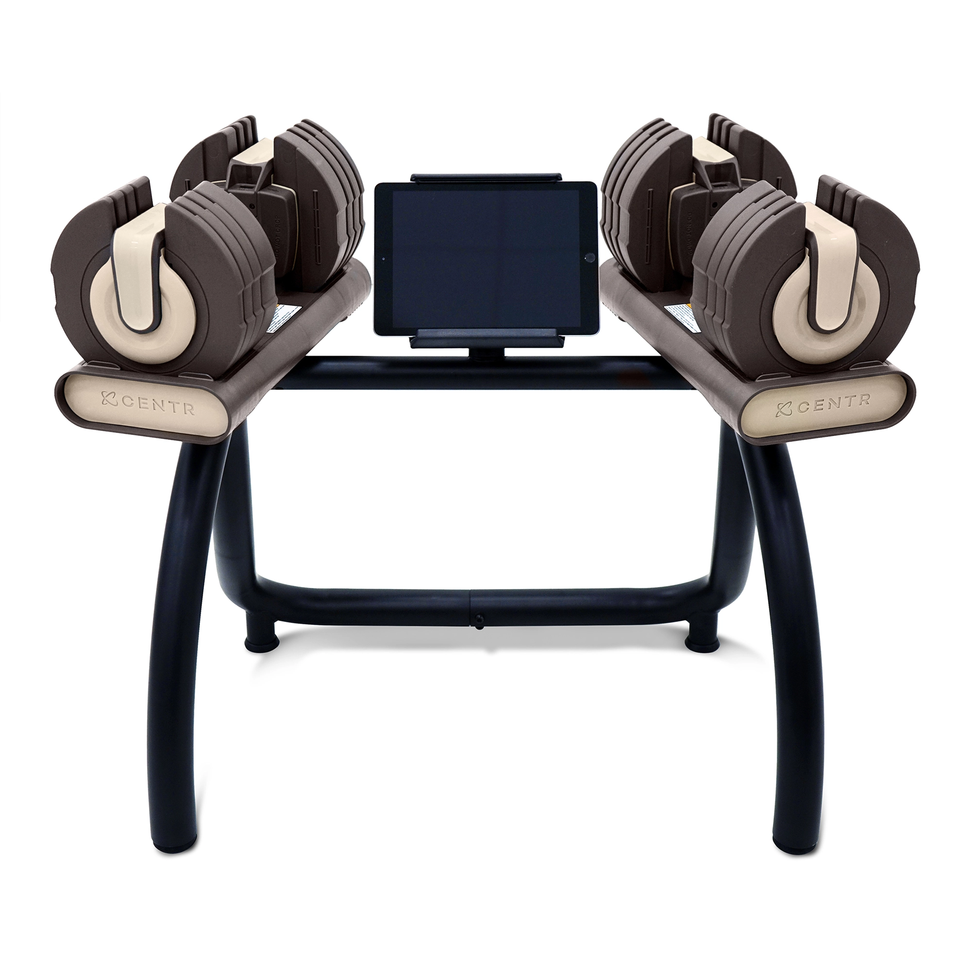 Verstelbare dumbbells op een standaard met een tablethouder. De gewichten zijn bruin en beige, de standaard is zwart.