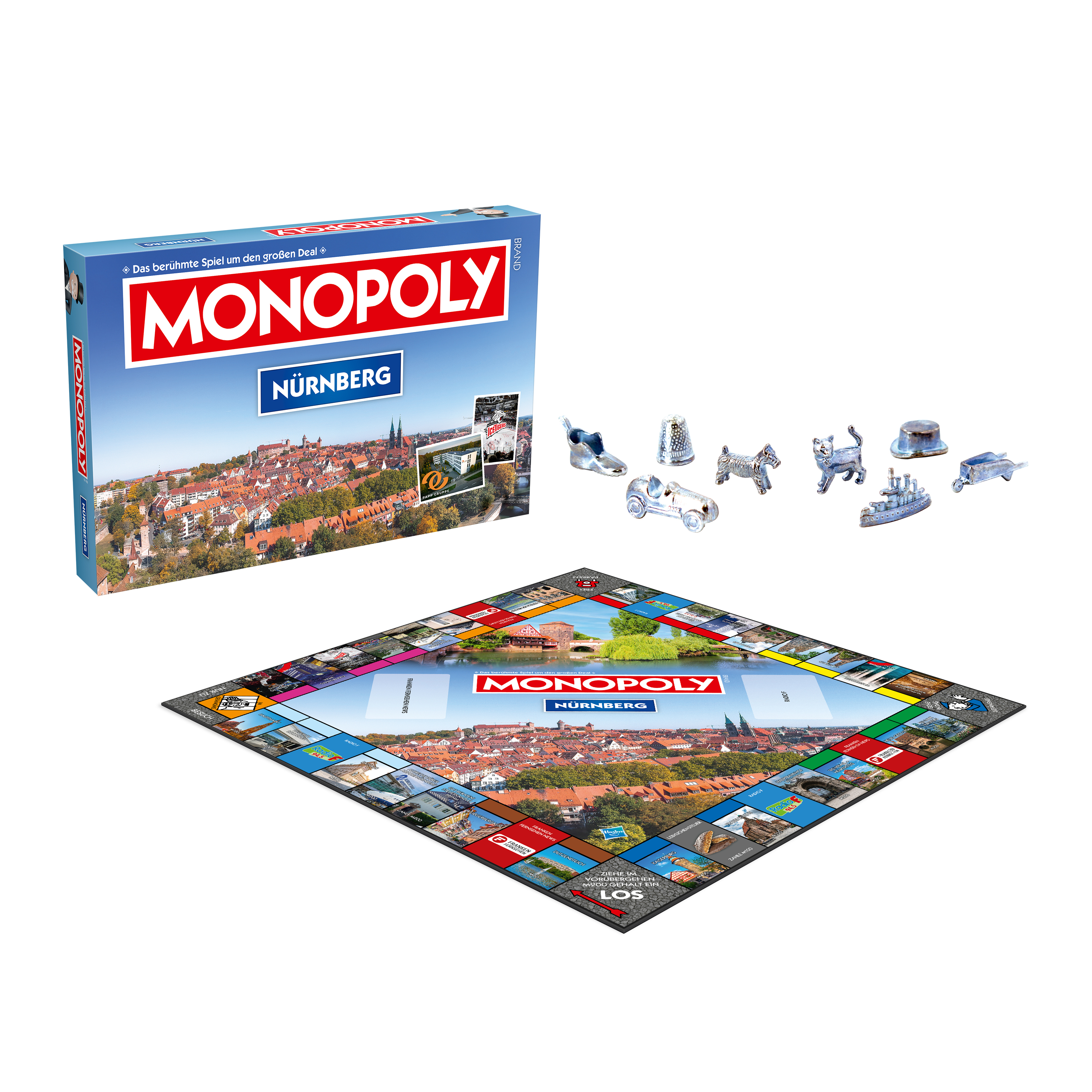 Monopoly-Brettspielbox und -Brett mit Spielfiguren. Stadtbild von Nürnberg im Hintergrund.