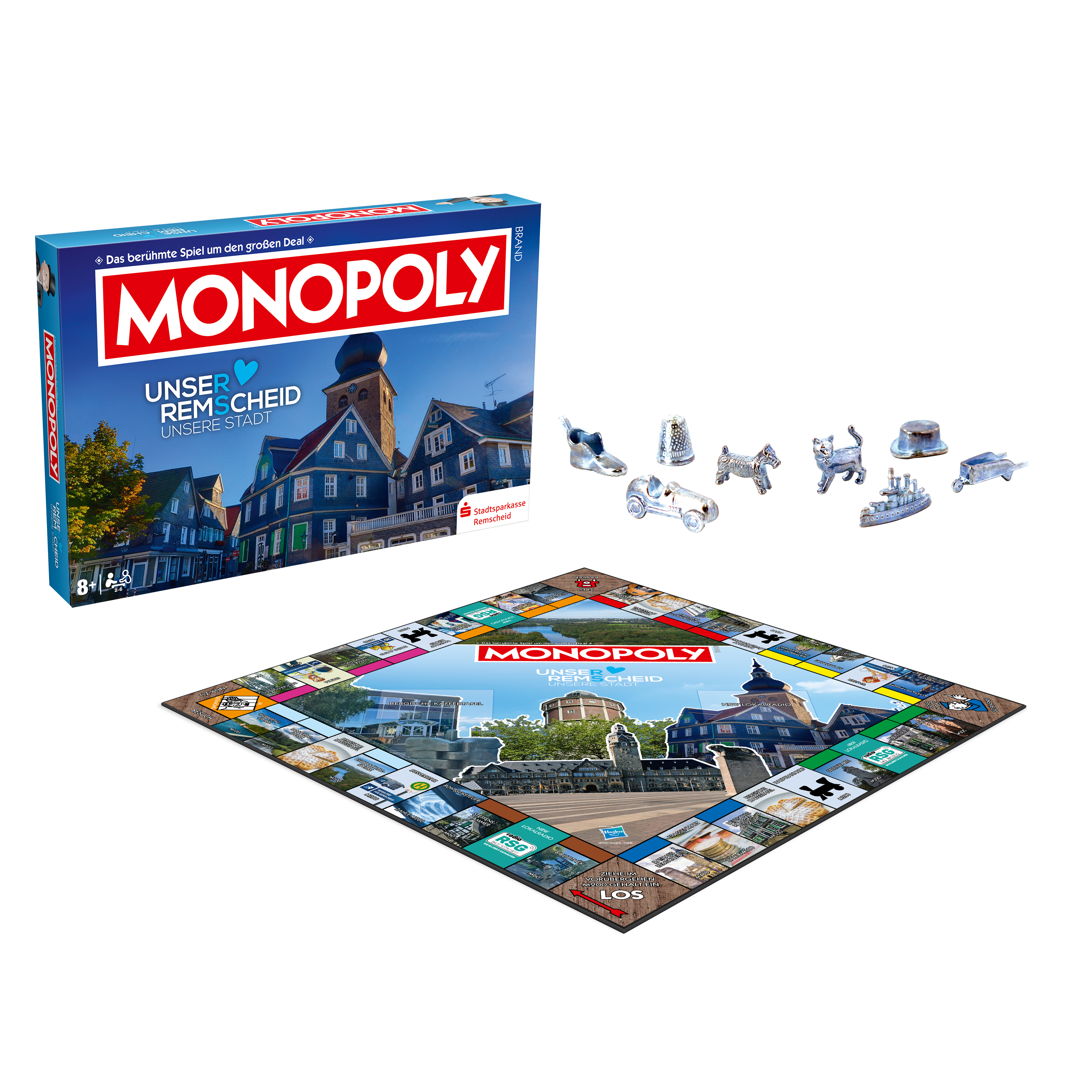 Eine Monopoly-Spielbox, ein Spielbrett und Spielsteine sind aufgebaut und zeigen die Komponenten des Spiels.