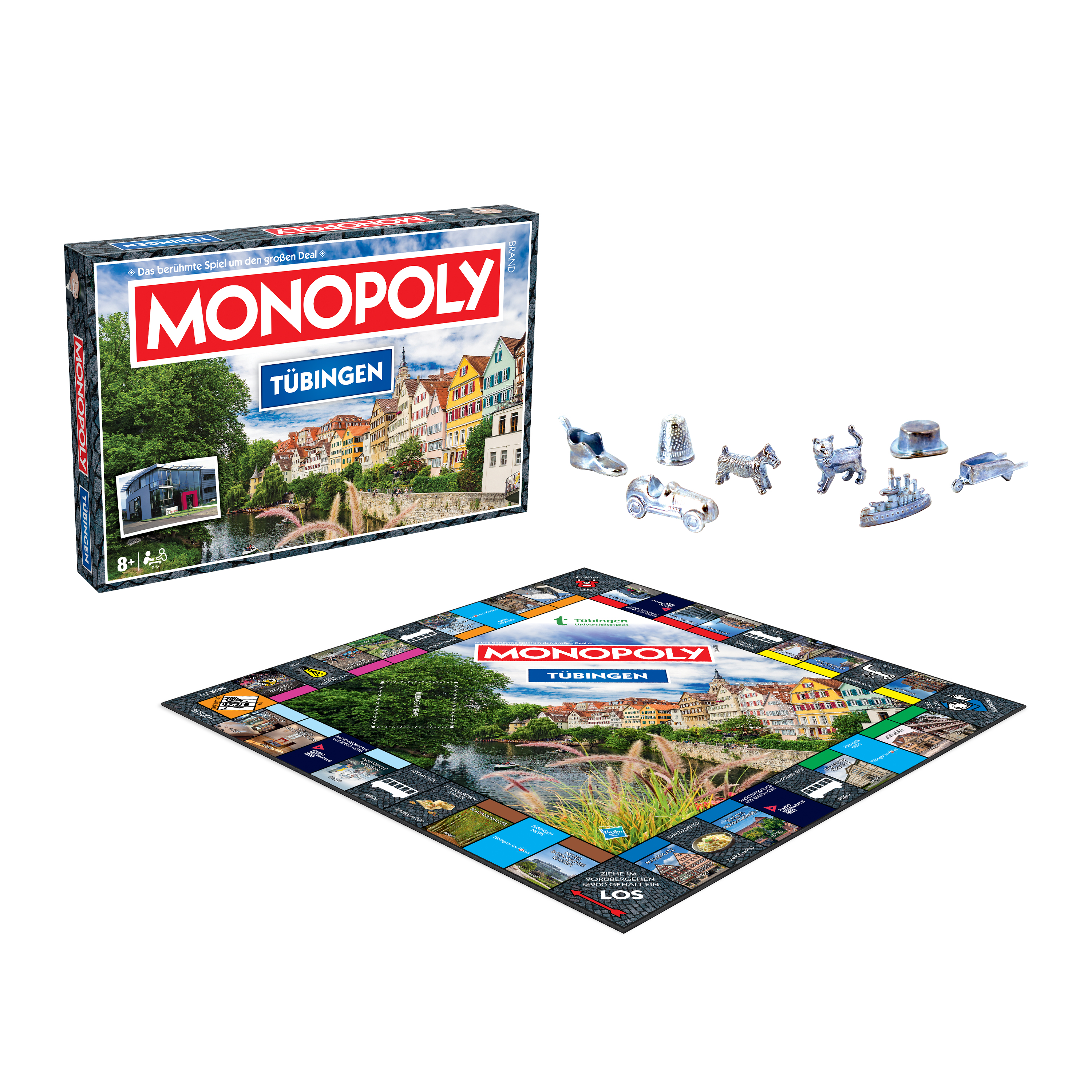 Monopoly-Brettspiel mit Schachtel, Spielbrett und Spielsteinen auf weißem Hintergrund.