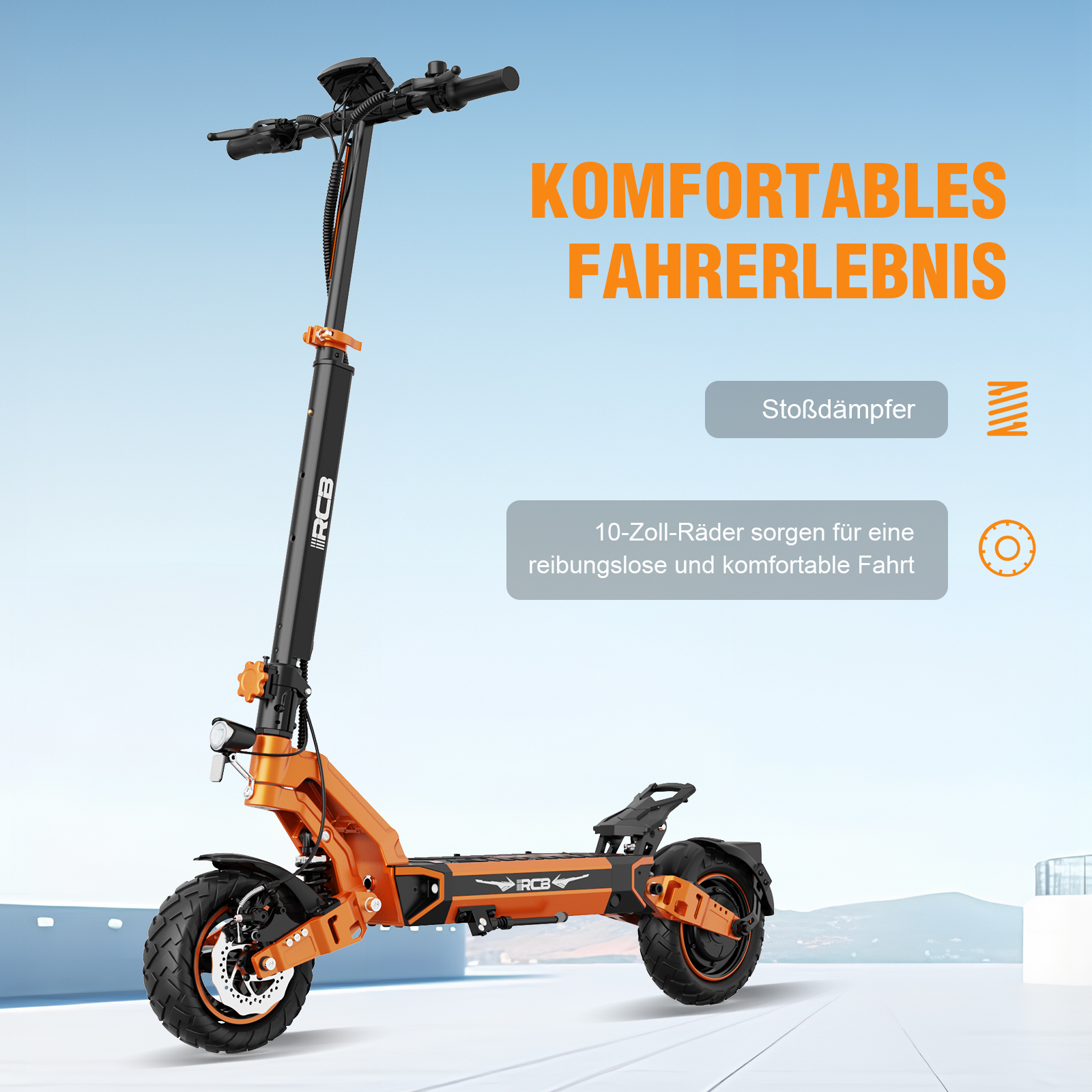 Pomarańczowa i czarna hulajnoga elektryczna. Tekst brzmi: 'Wygodne wrażenia z jazdy'.