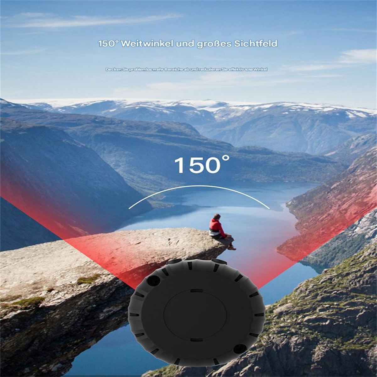 Eine schwarze Kamera mit roter Sicht, auf einem Berg. Eine Person sitzt darauf.