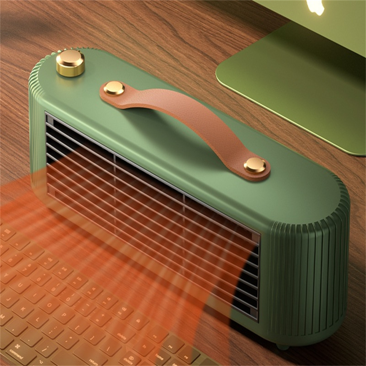 Grüner Schreibtischventilator auf einem Schreibtisch, mit Tastatur und Monitor im Hintergrund.