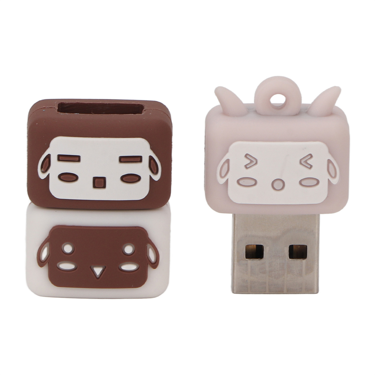 Zwei USB-Laufwerke, eines braun, eines rosa. Jedes hat ein Cartoon-Gesicht.