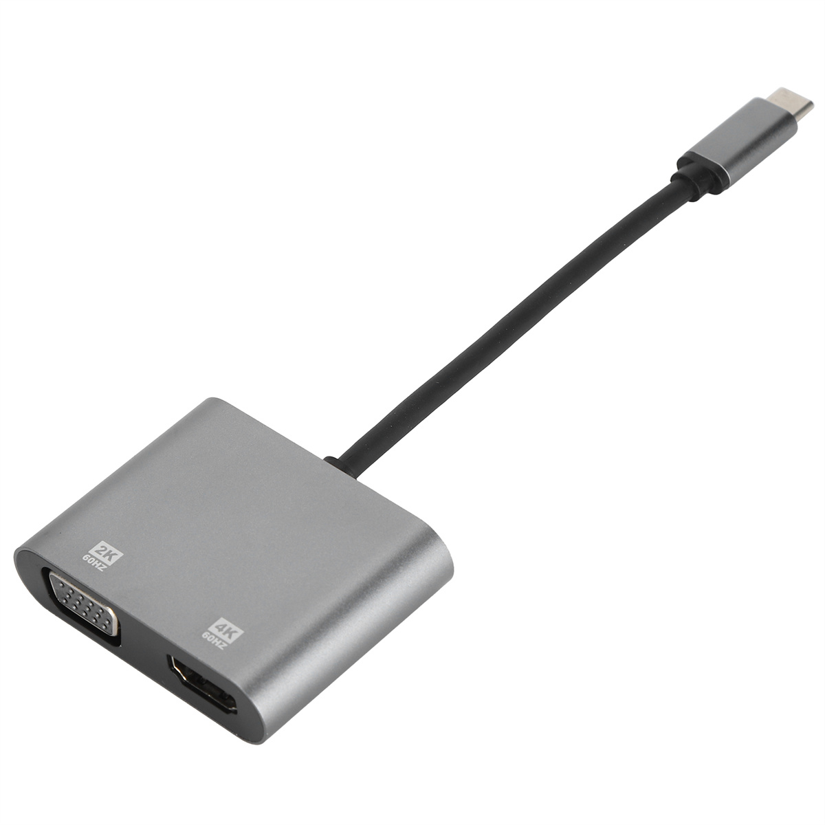 Ein grauer Adapter mit USB- und VGA-Anschlüssen und einem USB-C-Kabel.