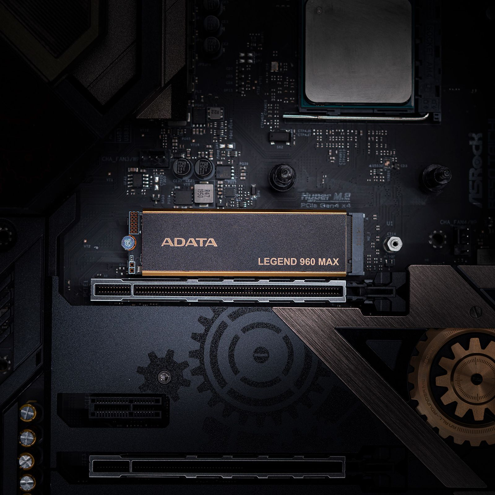 Czarny i złoty dysk SSD ADATA Legend 960 MAX M.2 zainstalowany na płycie głównej.
