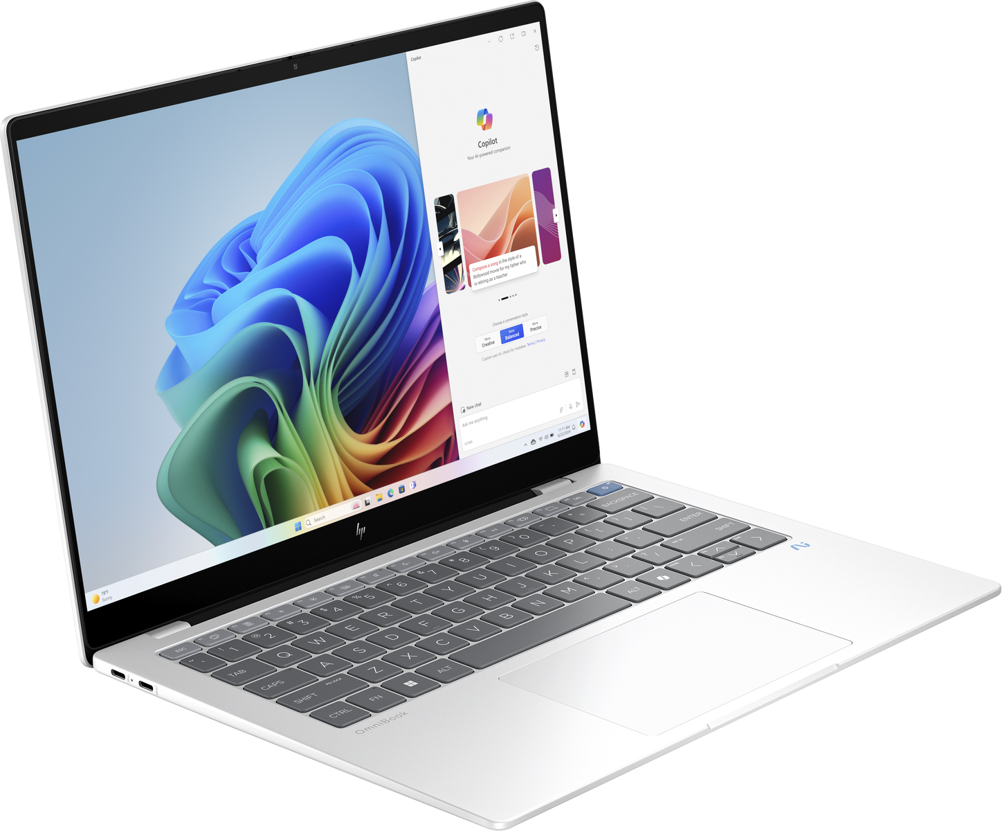 Un portátil blanco y plateado que muestra una pantalla con una página web.
