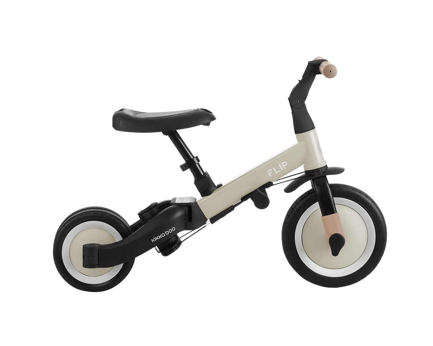 Beiges und schwarzes Laufrad für ein Kind. Auf dem Fahrrad steht 'Flip'.