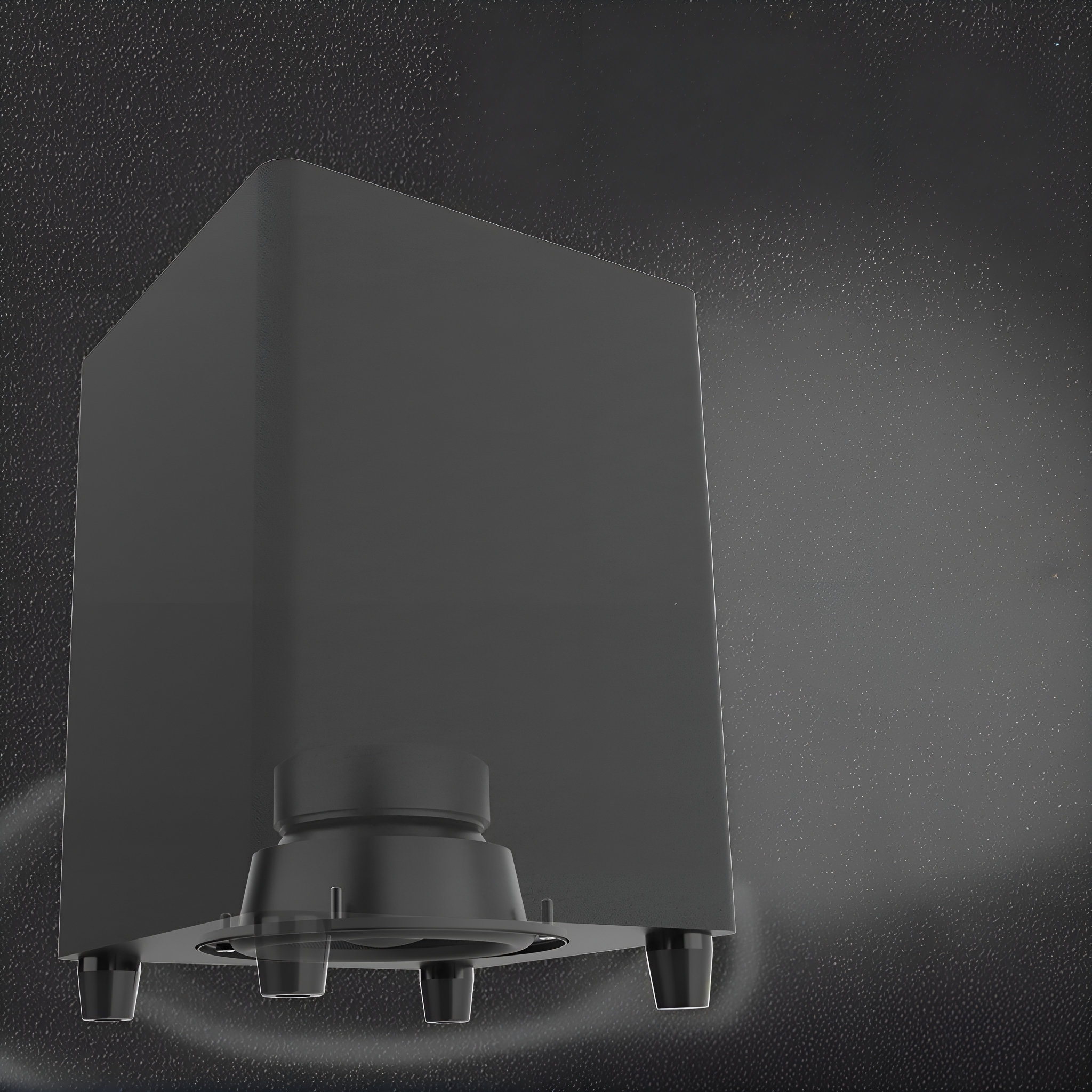 Ein schwarzer Subwoofer mit schwarzem Hintergrund und Wassereffekt.