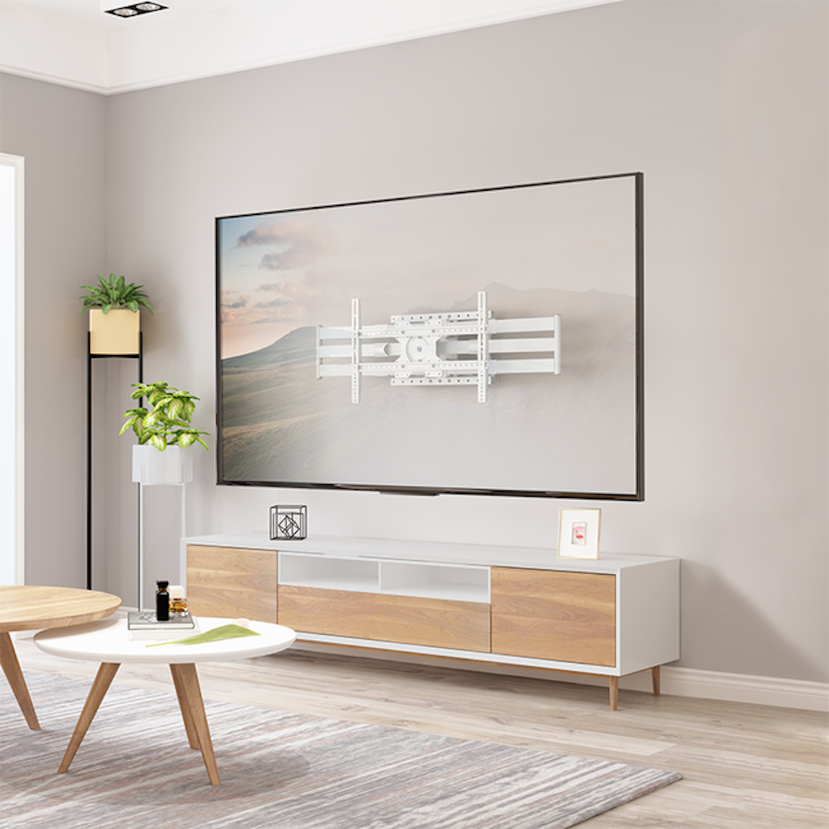 Modern living room with a TV mounted on the wall and a white cabinet.