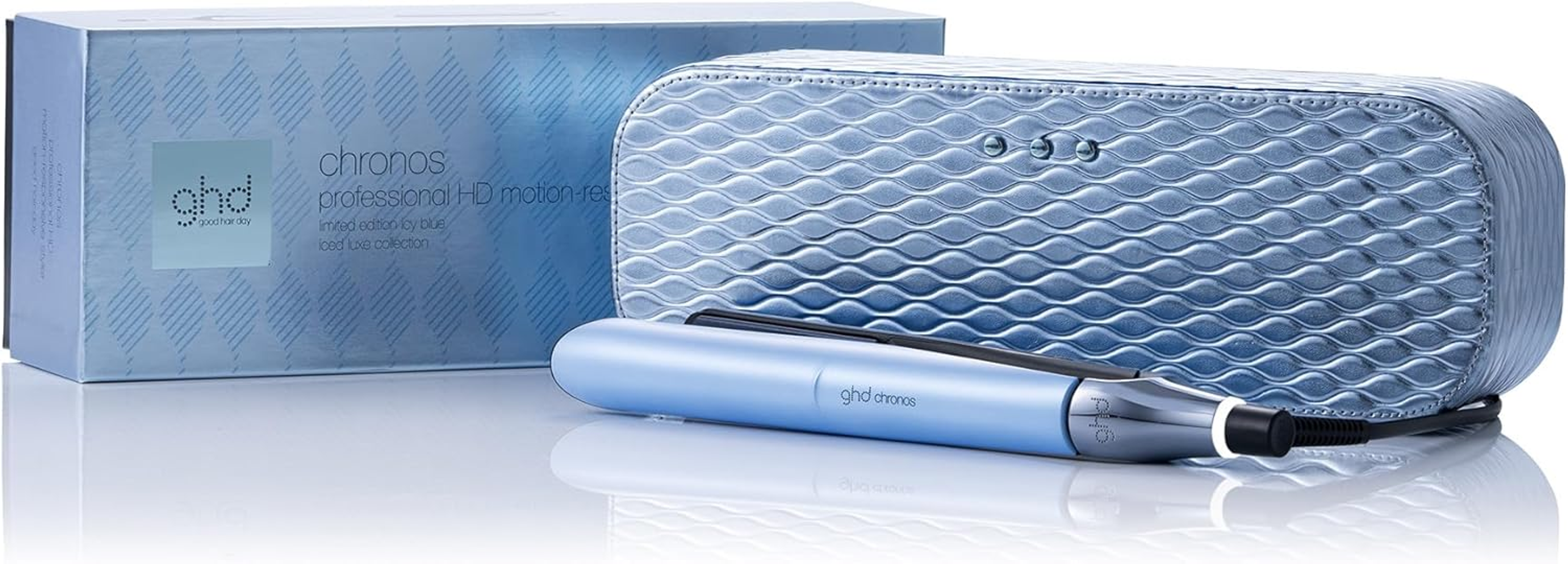 Una piastra per capelli ghd chronos blu, custodia e scatola.