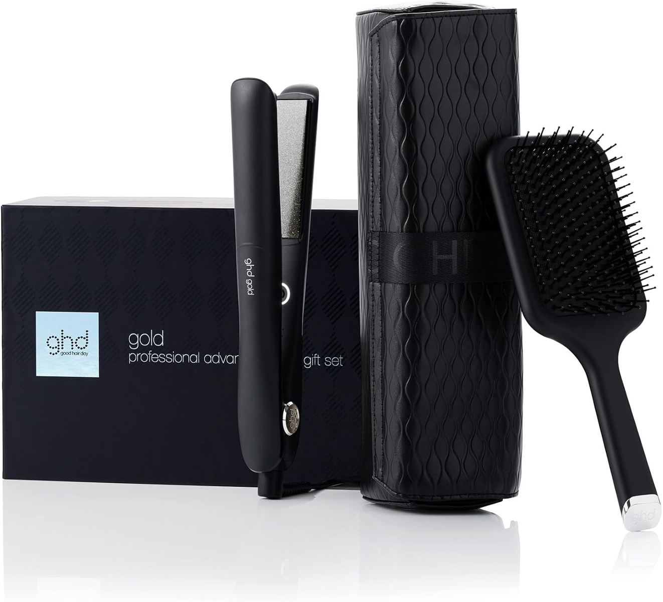 Set de peinado GHD negro, incluye plancha, cepillo y estuche.