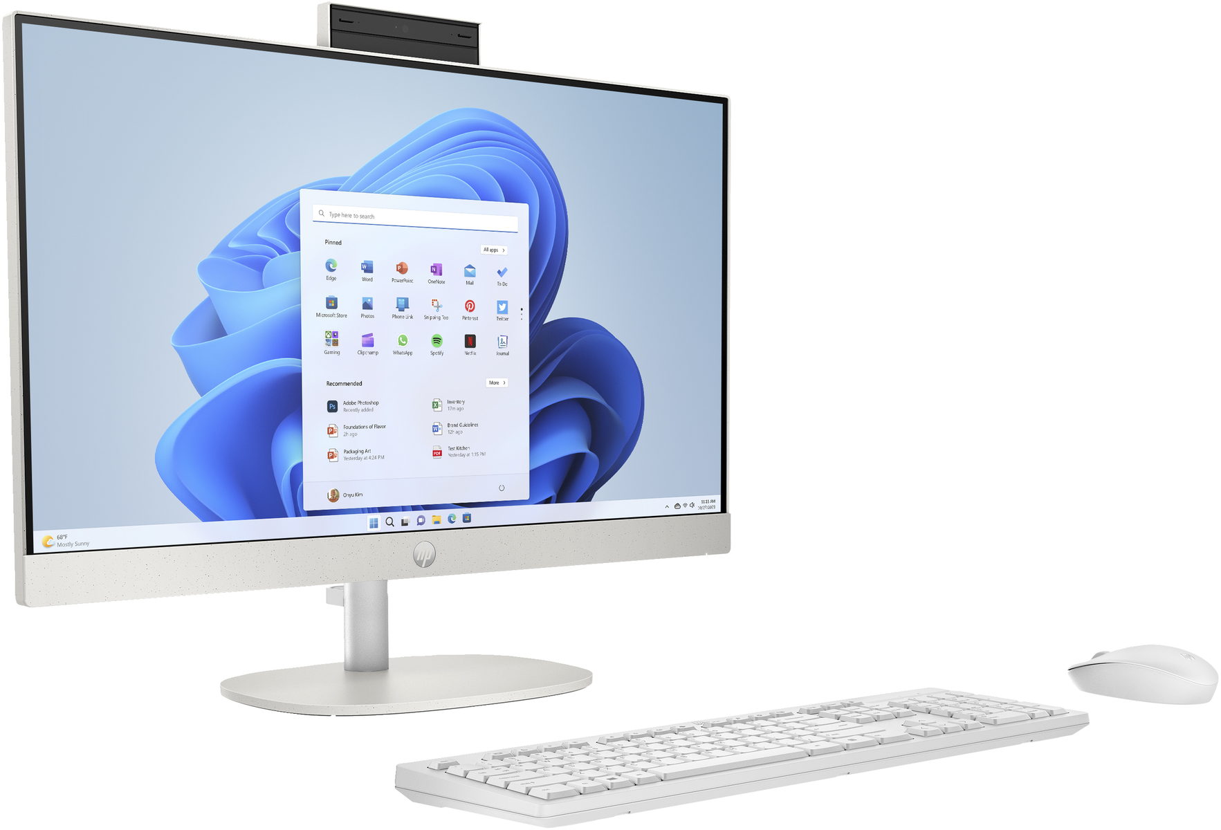 Ordenador todo en uno con pantalla, teclado y ratón, sobre fondo blanco.