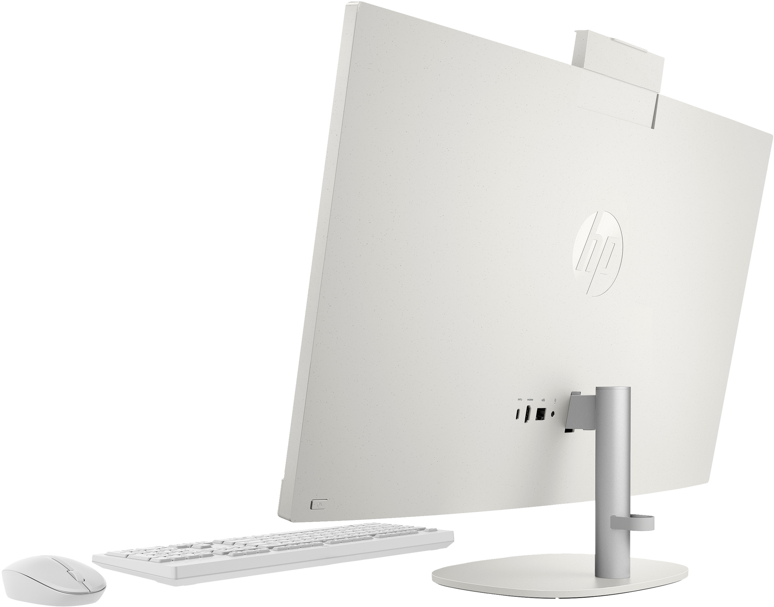 Vista trasera de una computadora HP todo en uno blanca con teclado y ratón.