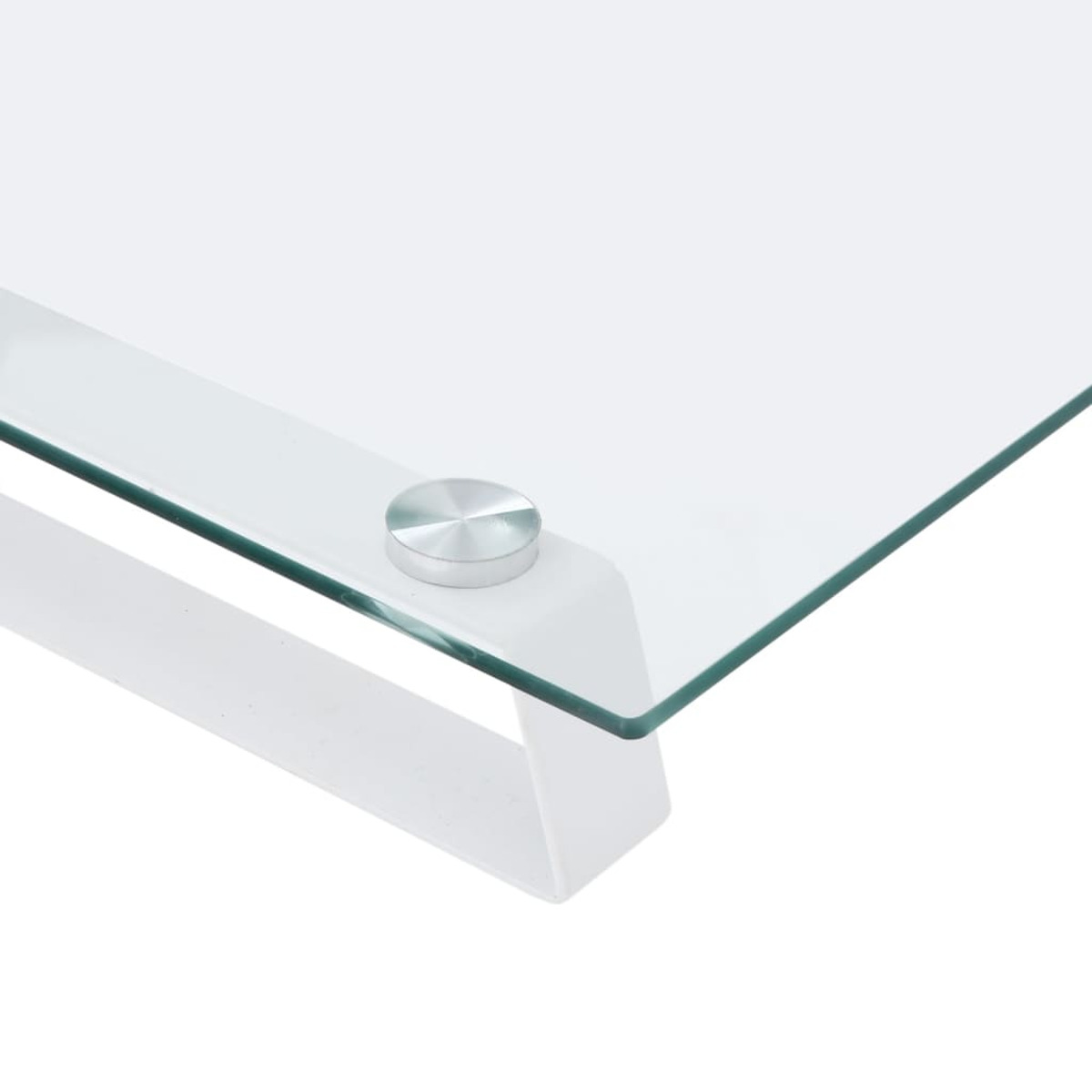 Glasecke des Tisches mit rundem, silberfarbenem Metallansatz. Weißer Rahmen.