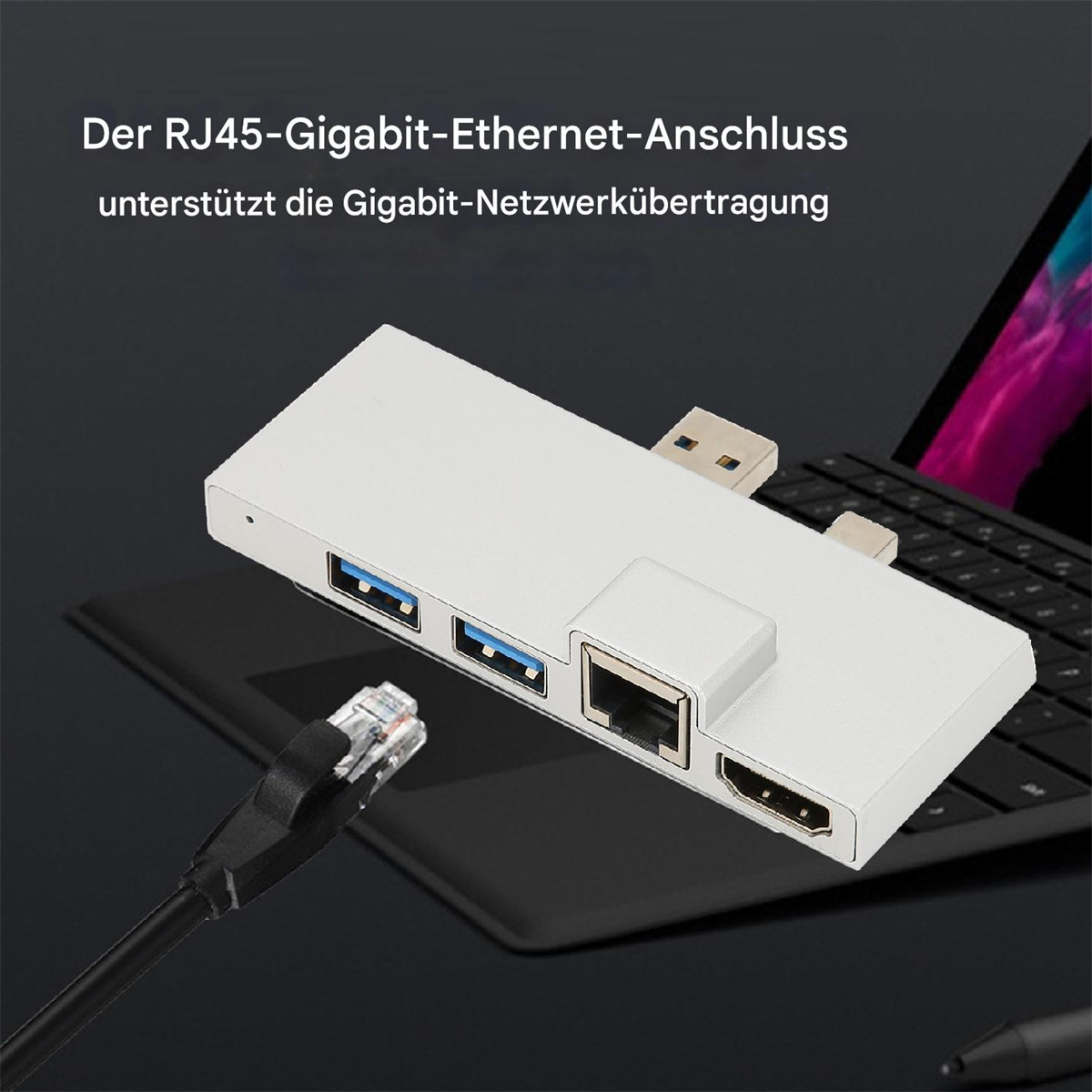 Ein weißer Hub mit USB-, Ethernet- und HDMI-Anschlüssen. Ein schwarzes Kabel ist angeschlossen. Text auf Deutsch.