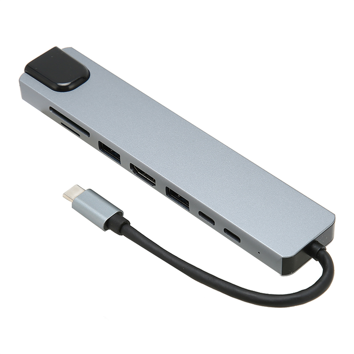 Ein grauer USB-C-Hub mit mehreren Anschlüssen und einem schwarzen Kabel, weißer Hintergrund.