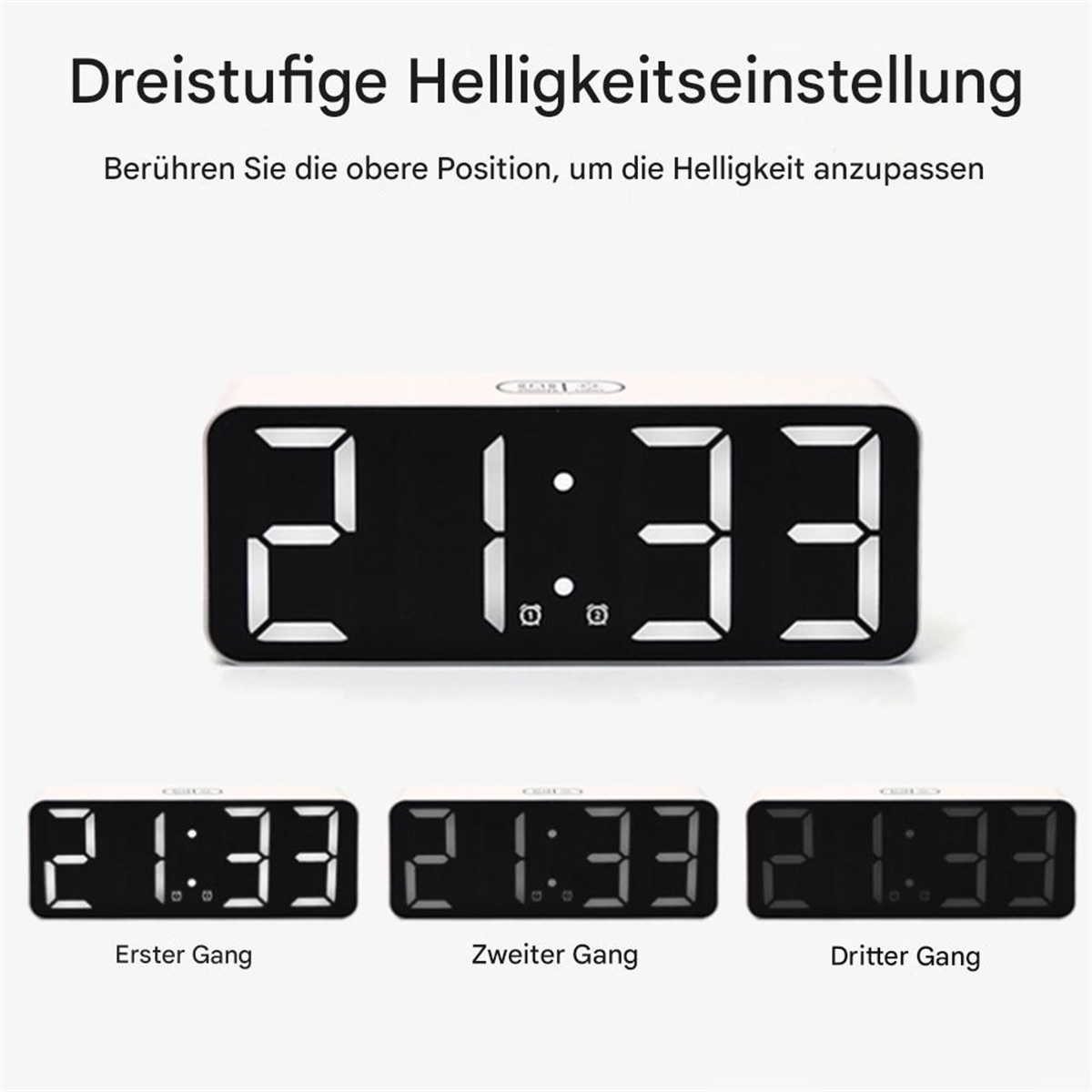 Digitaluhr zeigt 21:33 an. Drei Helligkeitseinstellungen werden unter der Uhr angezeigt.