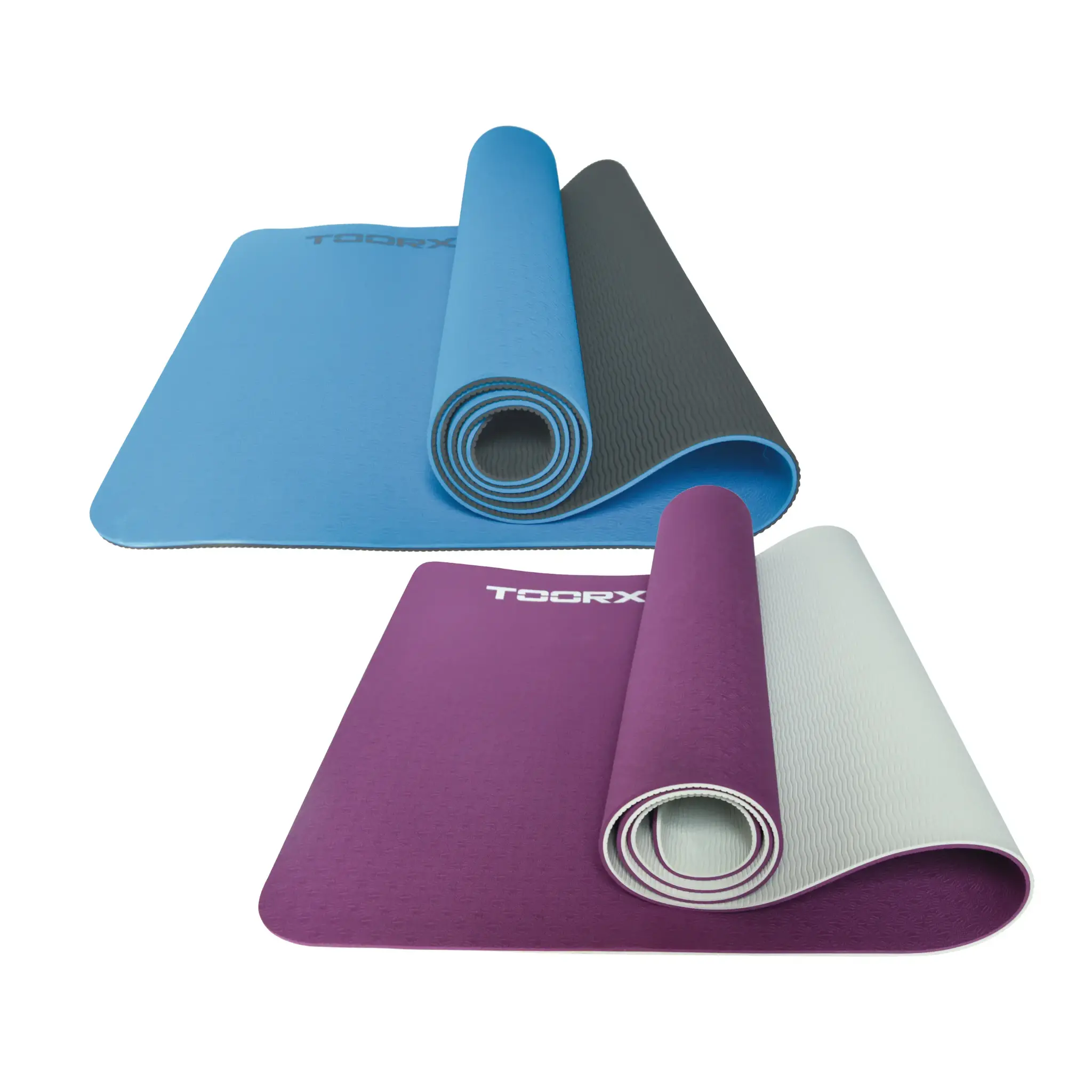 Rolled-up blue and gray yoga mats. A purple mat is also rolled up.