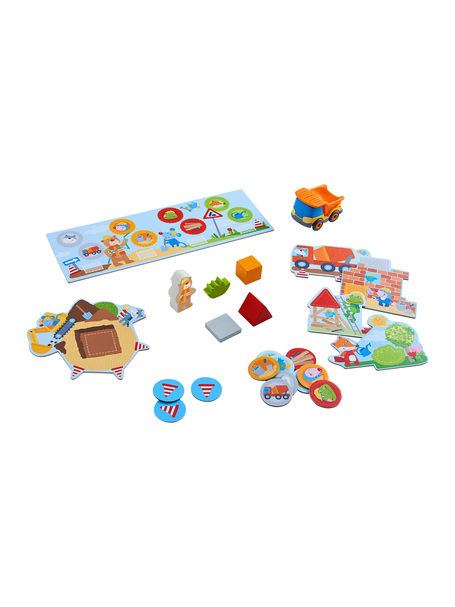 Kinderspielzeug mit verschiedenen Holzstücken, Lastwagen und Straßenschildern.
