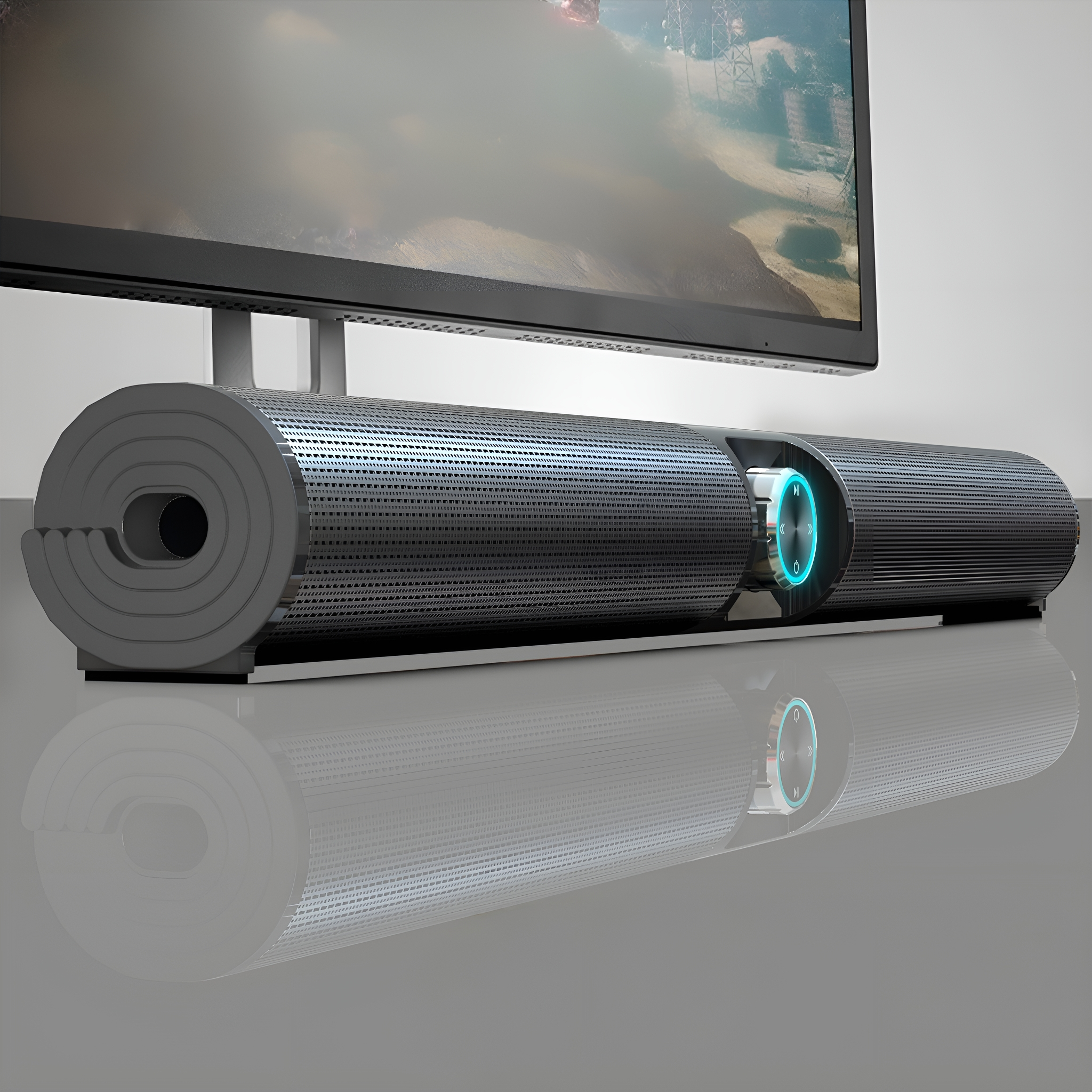 Silberne Soundbar mit blauem Licht. Die Soundbar befindet sich vor einem Monitor.