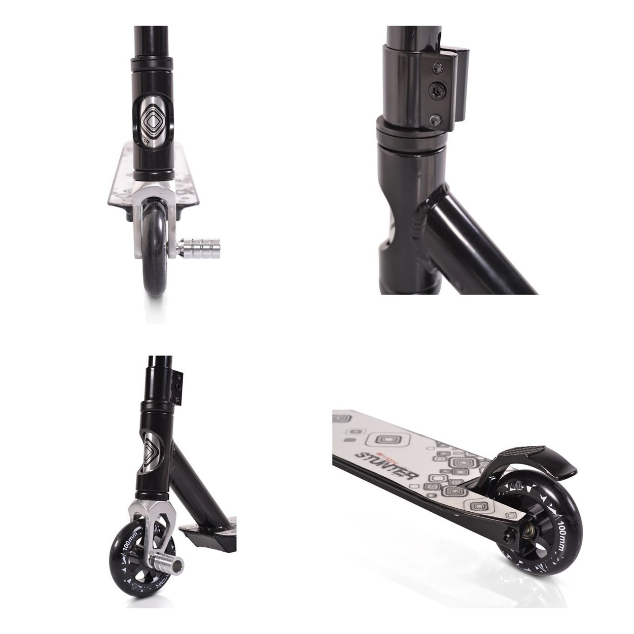 Rollerteile, schwarz und silber. Räder und Deckdetail. Weißer Hintergrund.