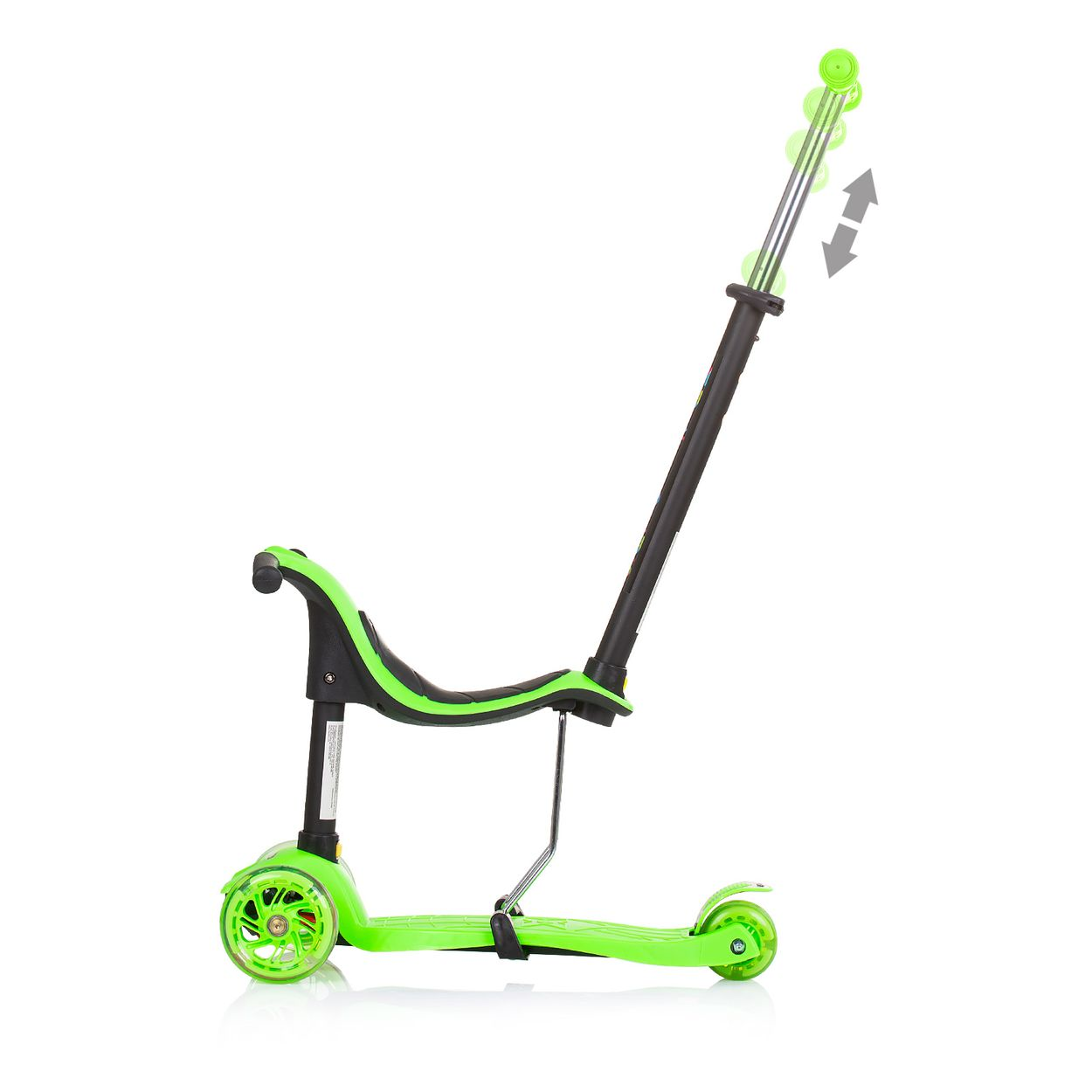 Patinete verde y negro con tres ruedas. Se transforma en asiento con asa.