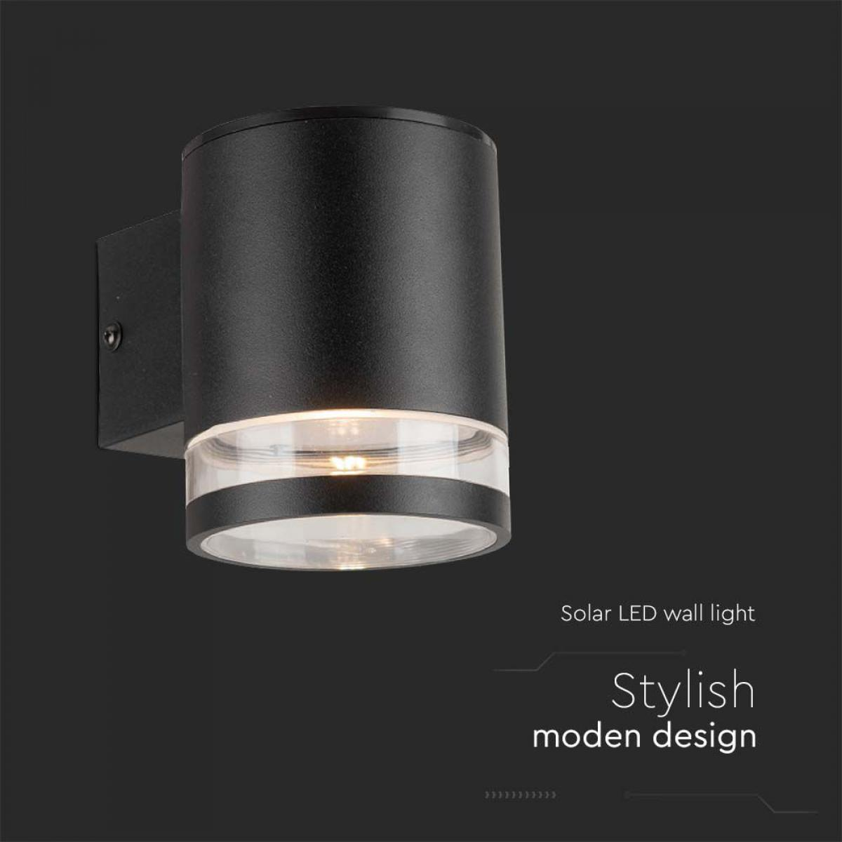 Schwarze, zylindrische Solar-LED-Wandleuchte mit klarem Boden, stilvolles modernes Design.