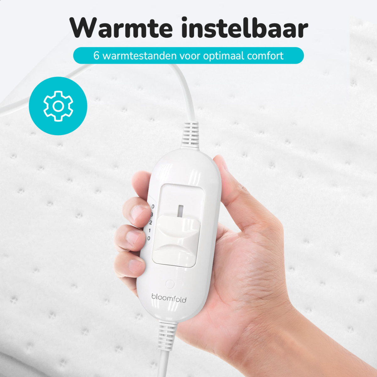 A hand holding a white control with a switch. Text on top says: Warmte instelbaar.
