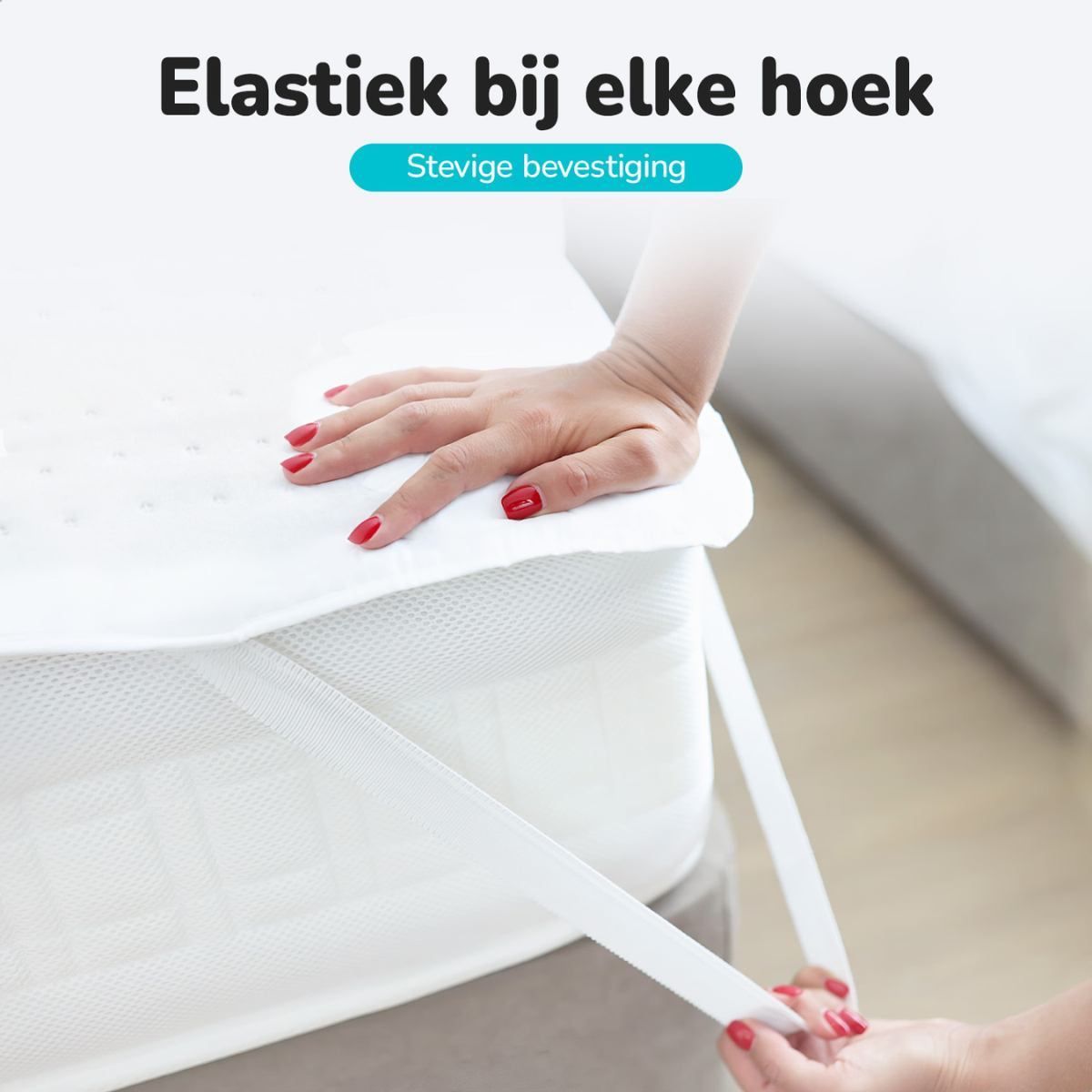 Hand stretches elastic on mattress cover. Text: Elastic at every corner.