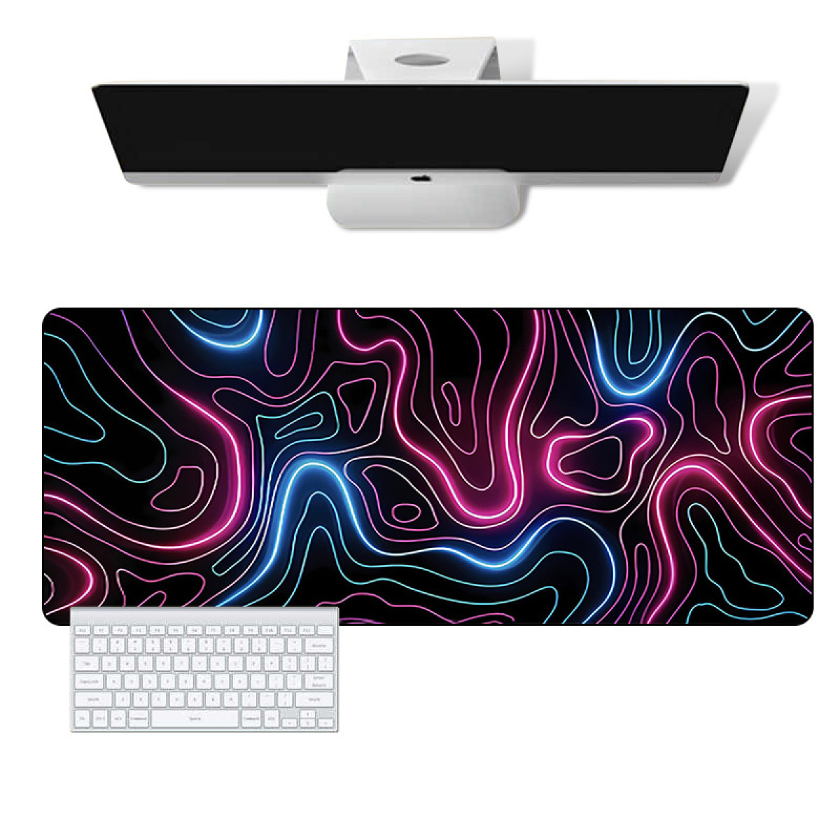 Widok z góry na monitor, klawiaturę i podkładkę pod mysz z neonowym wzorem na czarnym tle.