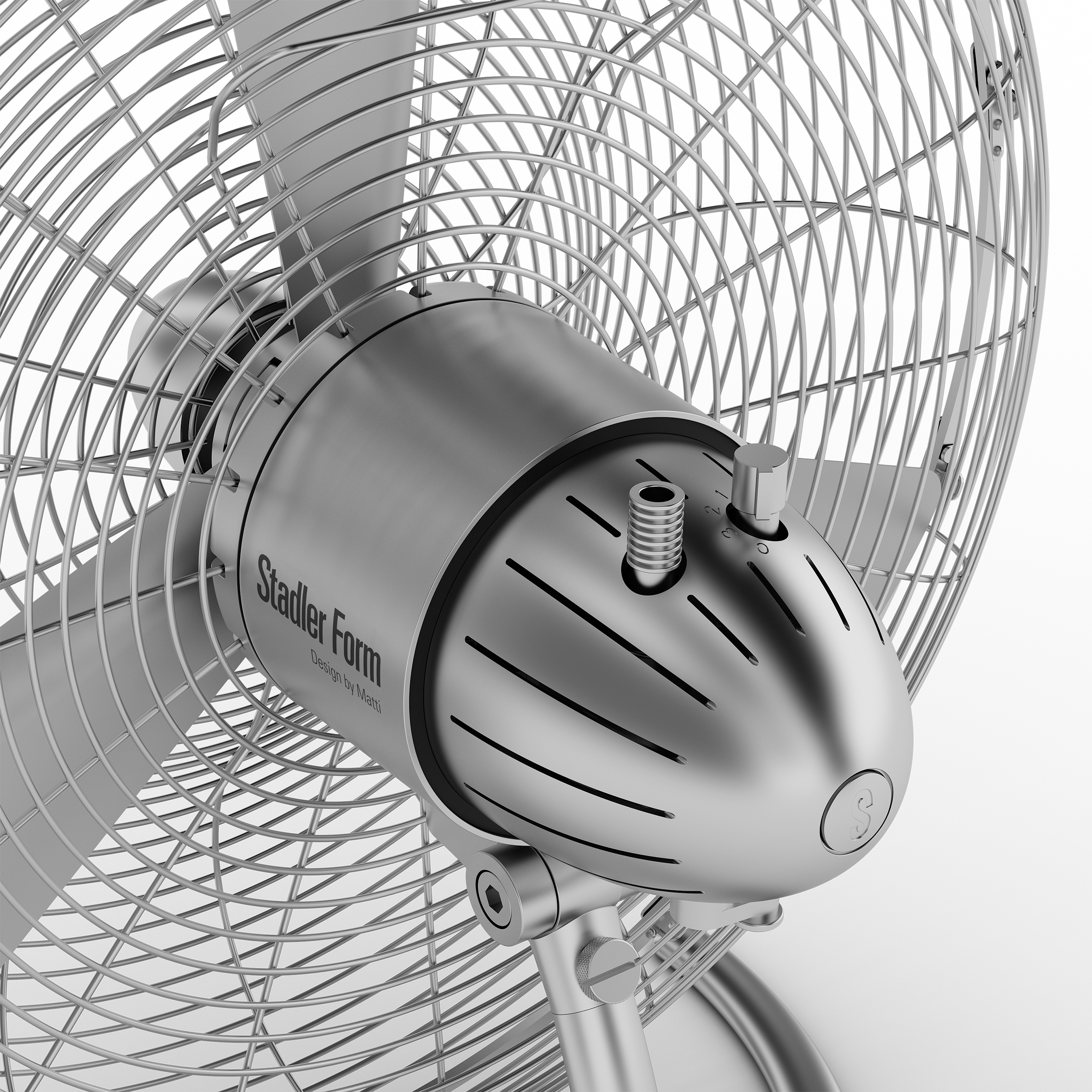 Ventilateur Stadler Form argenté métallique sur fond blanc.