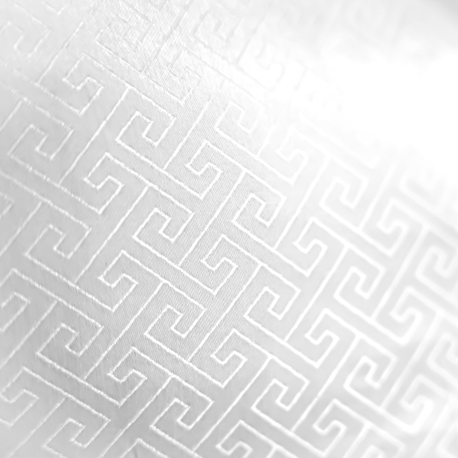 Weißer Stoff mit geometrischem Muster. Nahaufnahme. Strukturierte Oberfläche.