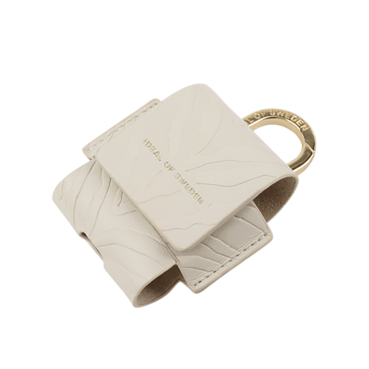 Una funda de cuero blanco con un anillo dorado, con el texto 'IDEAS OF SWEDEN'.