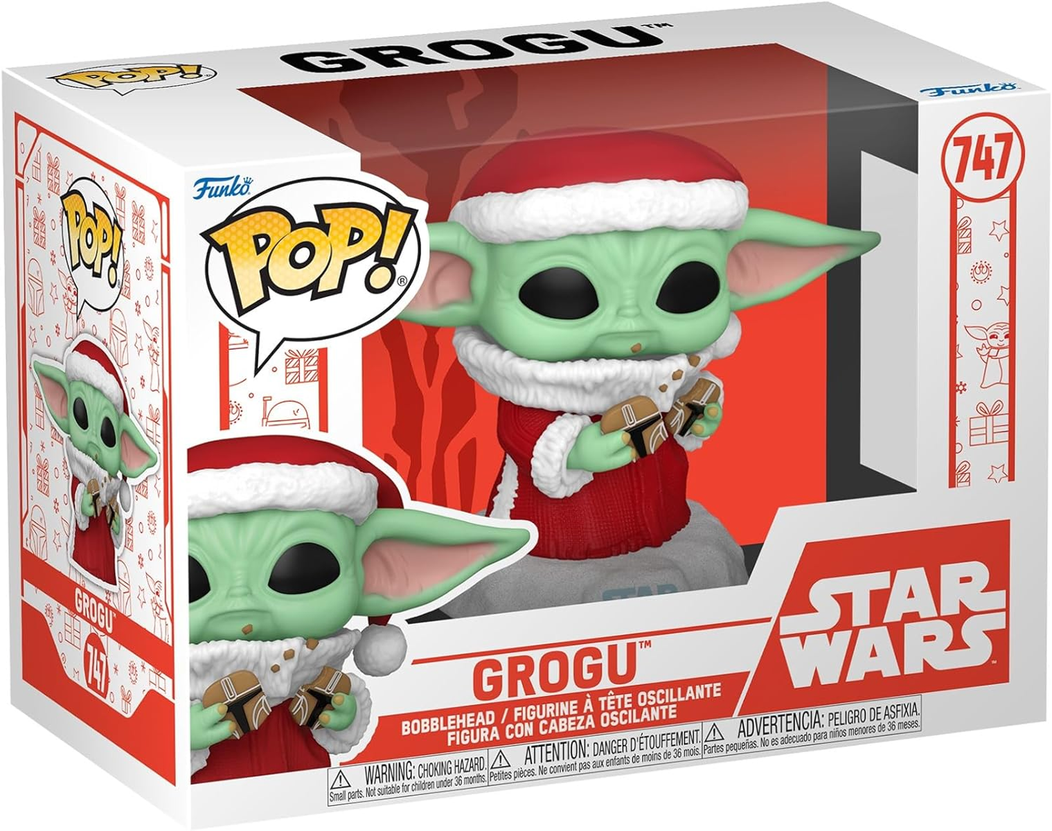 Figura de Grogu con un traje navideño en una caja. La caja muestra a Grogu sosteniendo galletas.