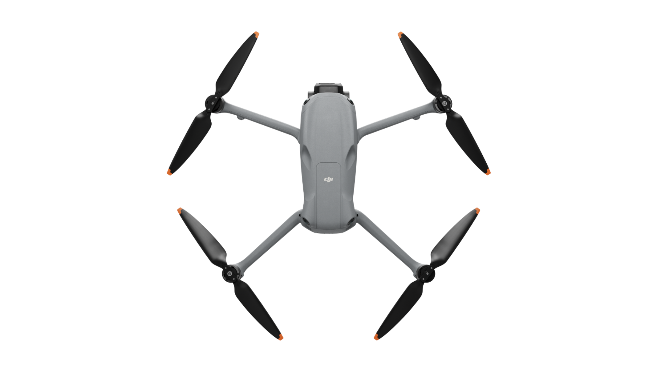 Drone grigio con quattro eliche nere e punte arancioni, visto dall'alto, su sfondo nero.