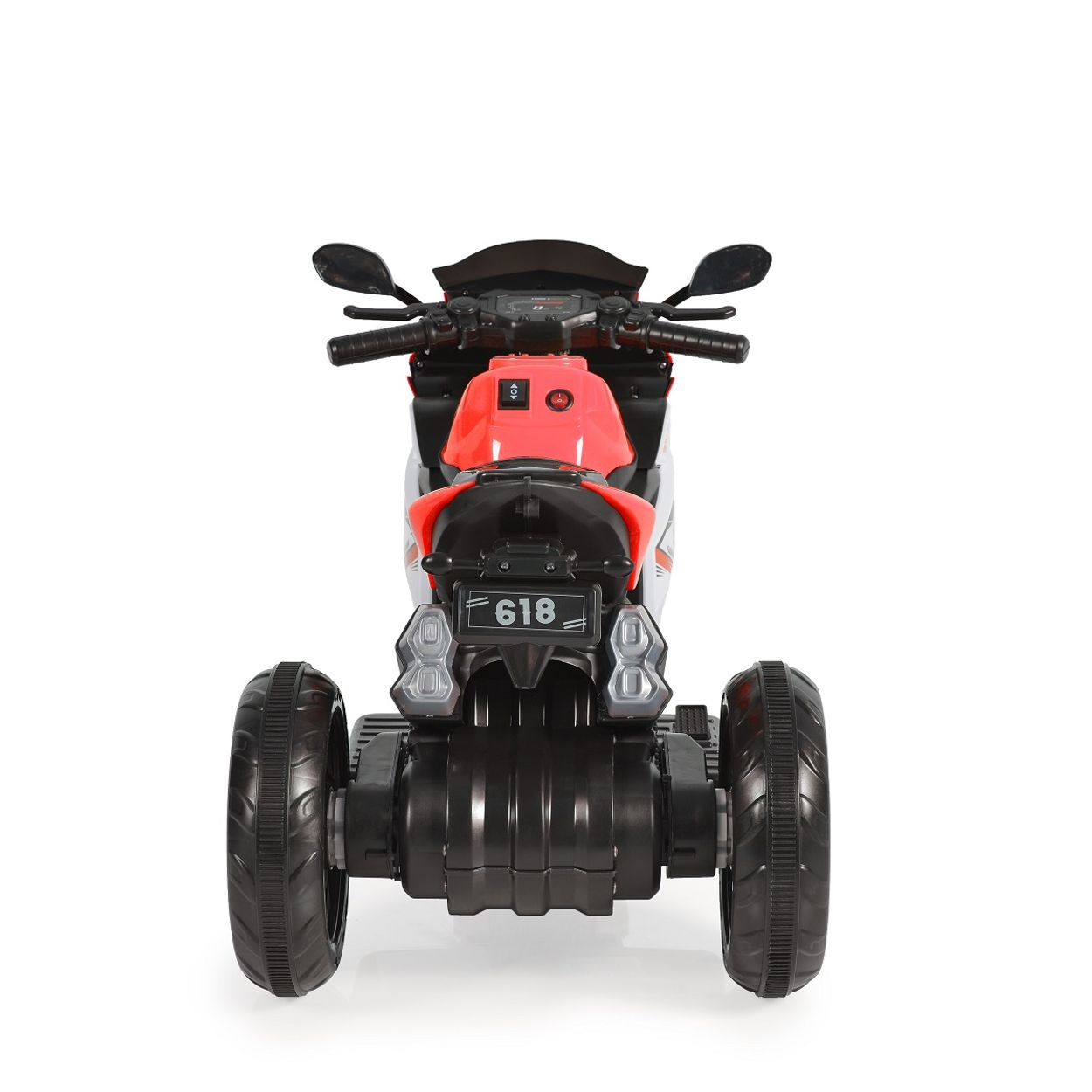 Ein rotes und schwarzes Spielzeugmotorrad. Es wird von hinten betrachtet.
