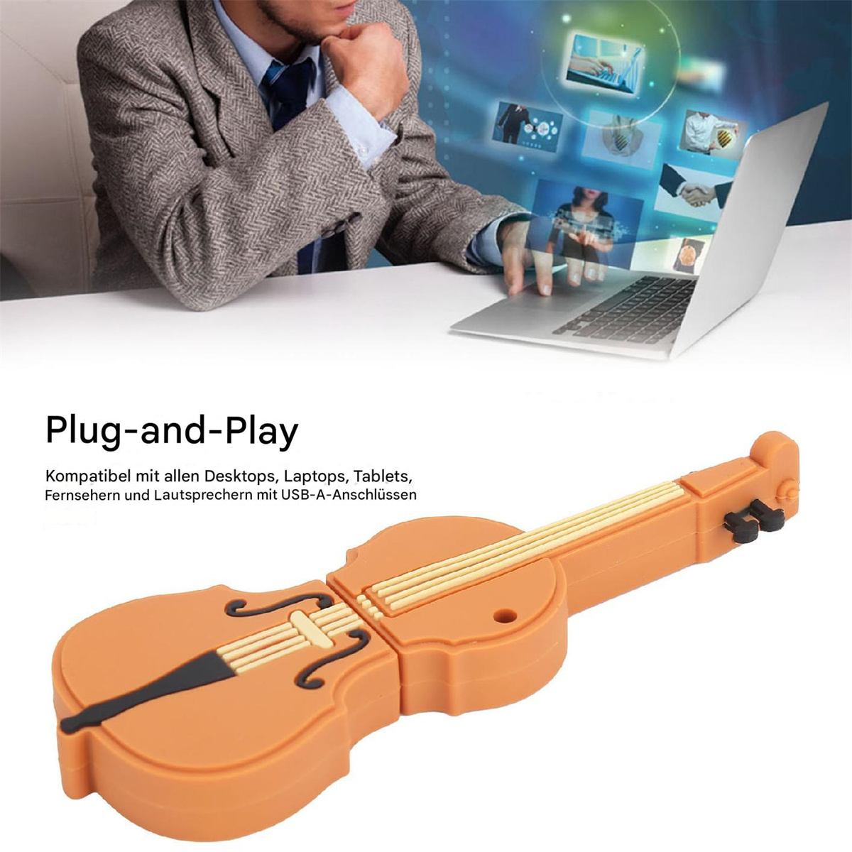 Ein orangefarbener USB-Stick in Geigenform liegt vor einem Mann, der einen Laptop benutzt.