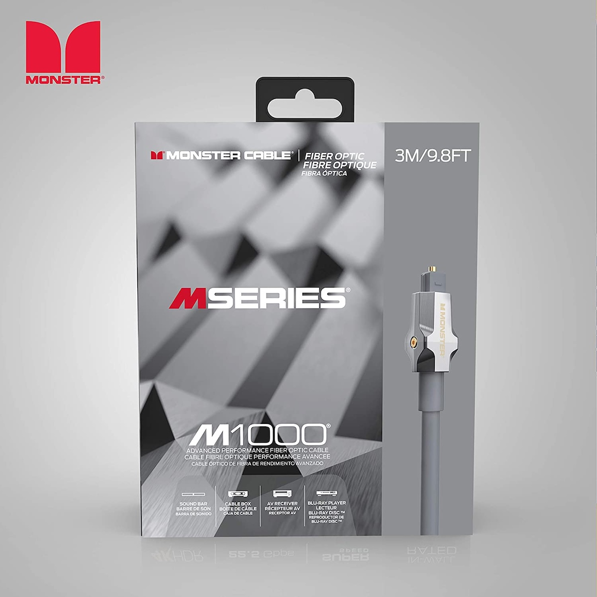 Una scatola di cavo in fibra ottica Monster Cable, con testo e un cavo grigio su sfondo bianco.