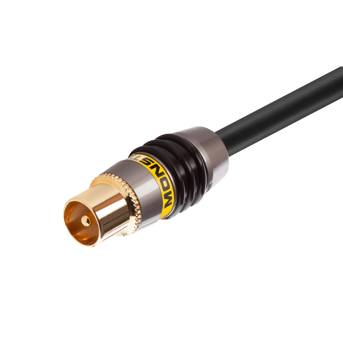 Un cable negro con un conector dorado etiquetado Monster, sobre un fondo blanco.