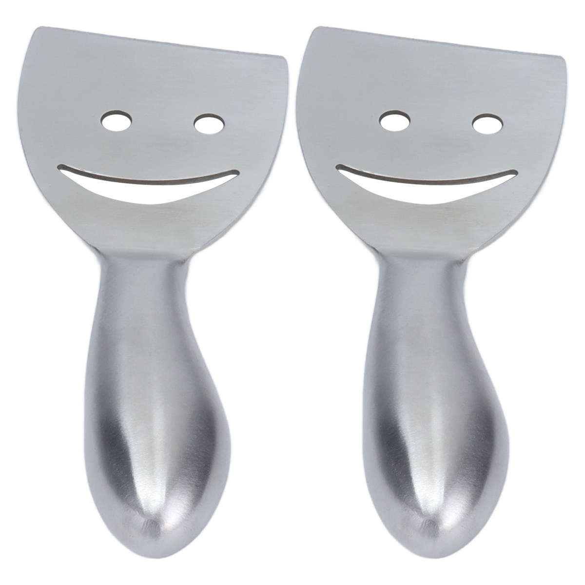 Zwei spatelartige Objekte aus Edelstahl mit Smiley-Ausschnitten. Sie haben gebogene Griffe.